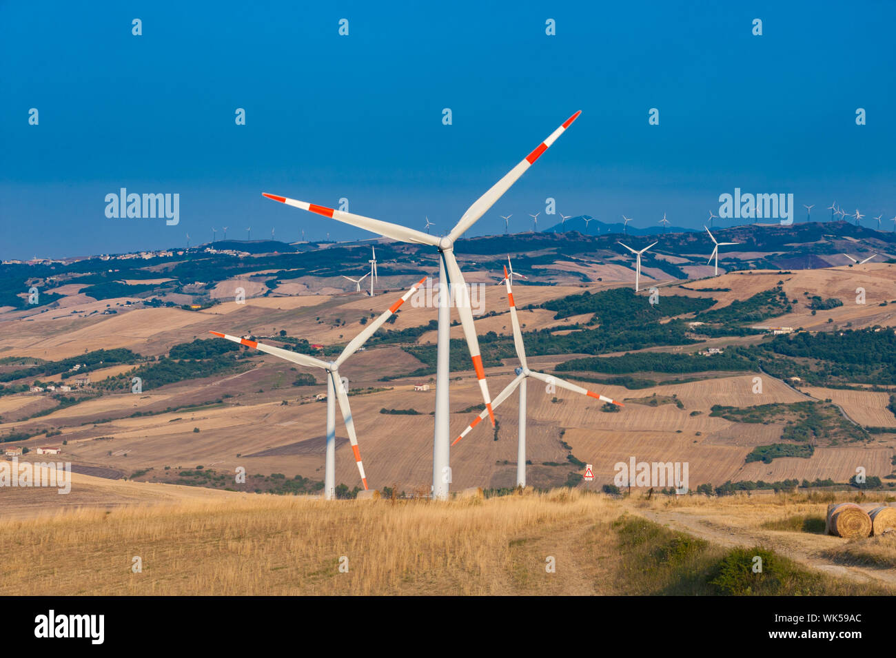 The Capitanata hills in north Apulia hosts a big number of wind generators. Stock Photo