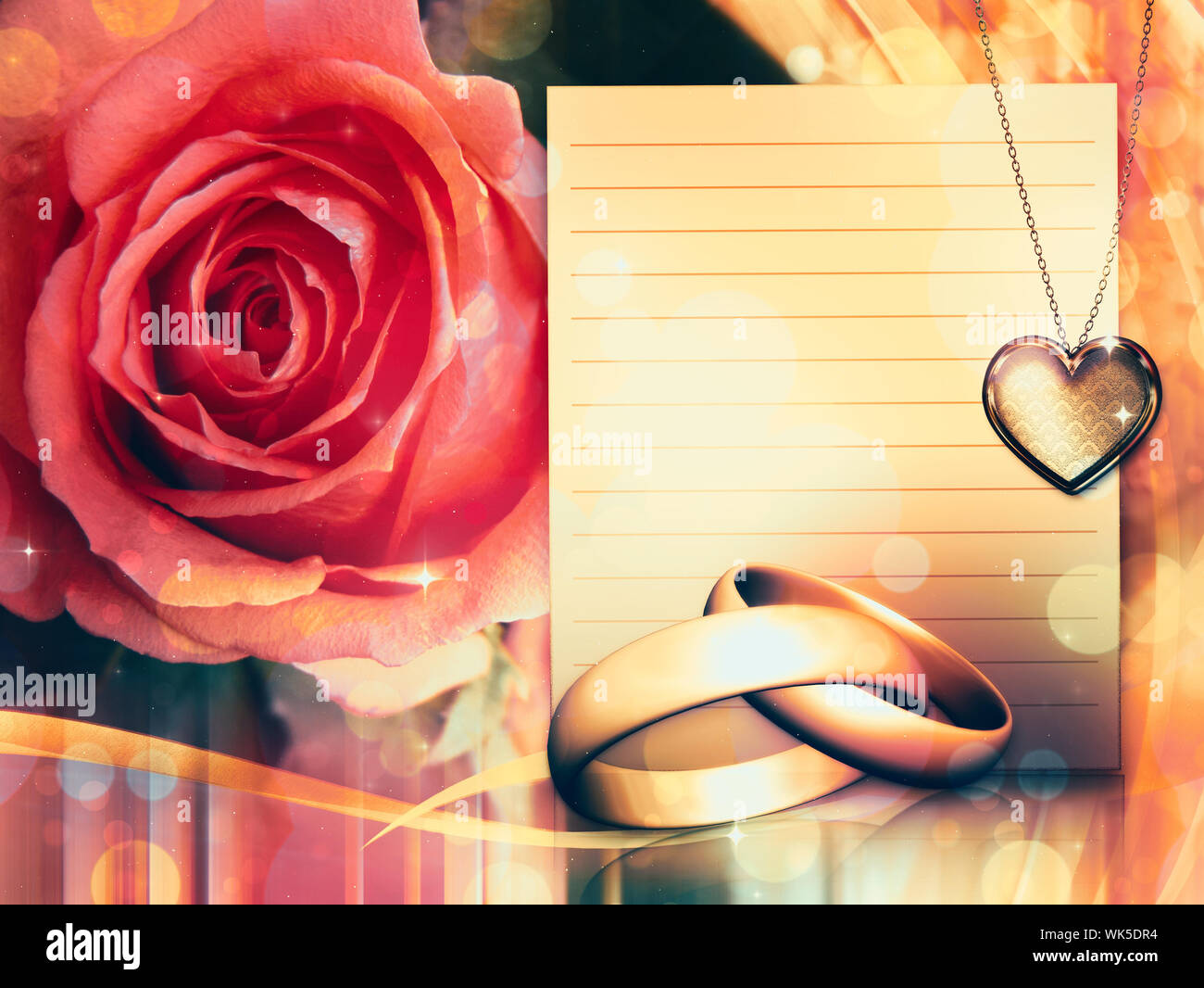 Golden wedding rings and beautiful red rose background Stock Photo - Alamy