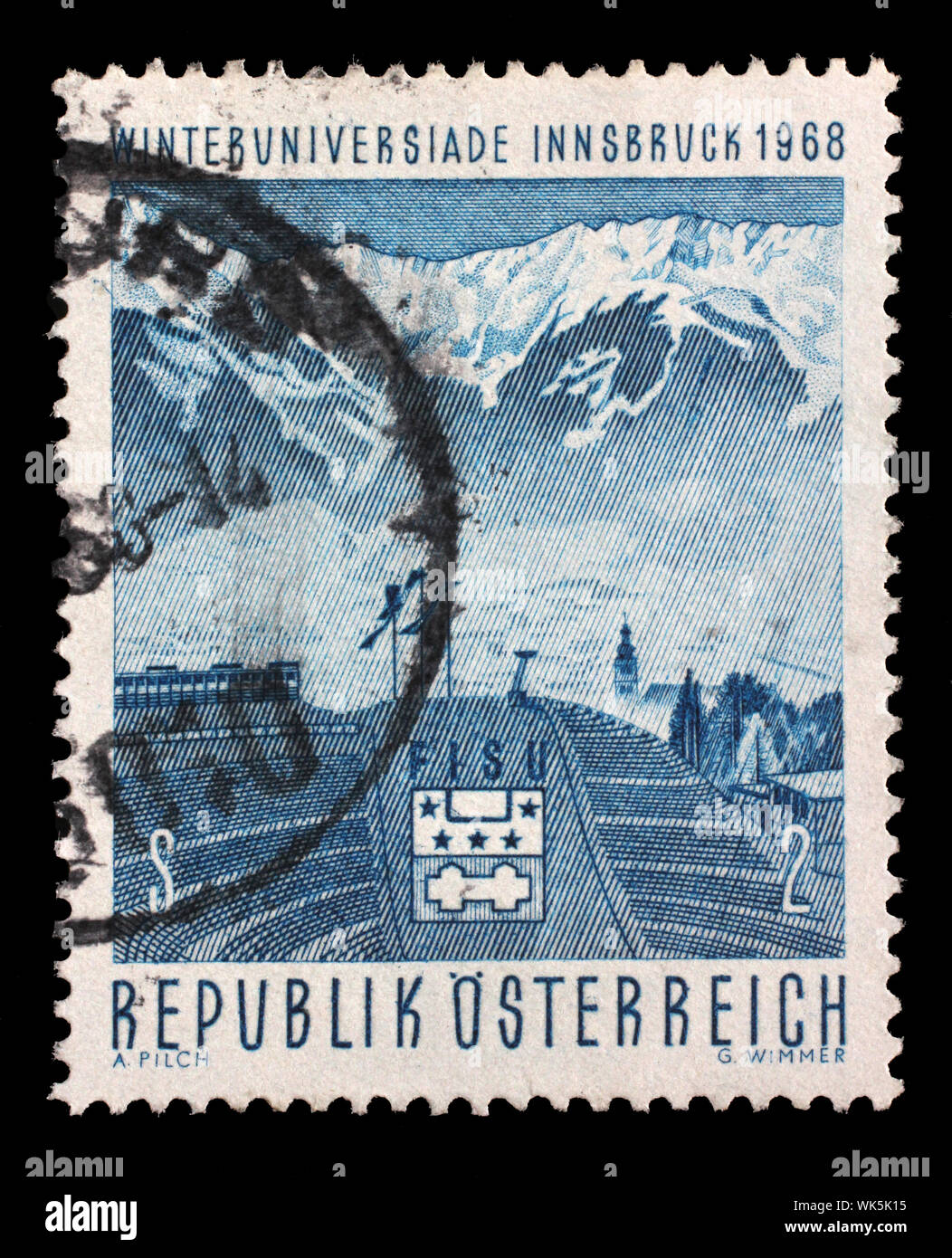 Stamp issued in the Austria shows Berg Isel ski-jump with view on the northern mountain range, University Winter Games in Innsbruck, circa 1968. Stock Photo
