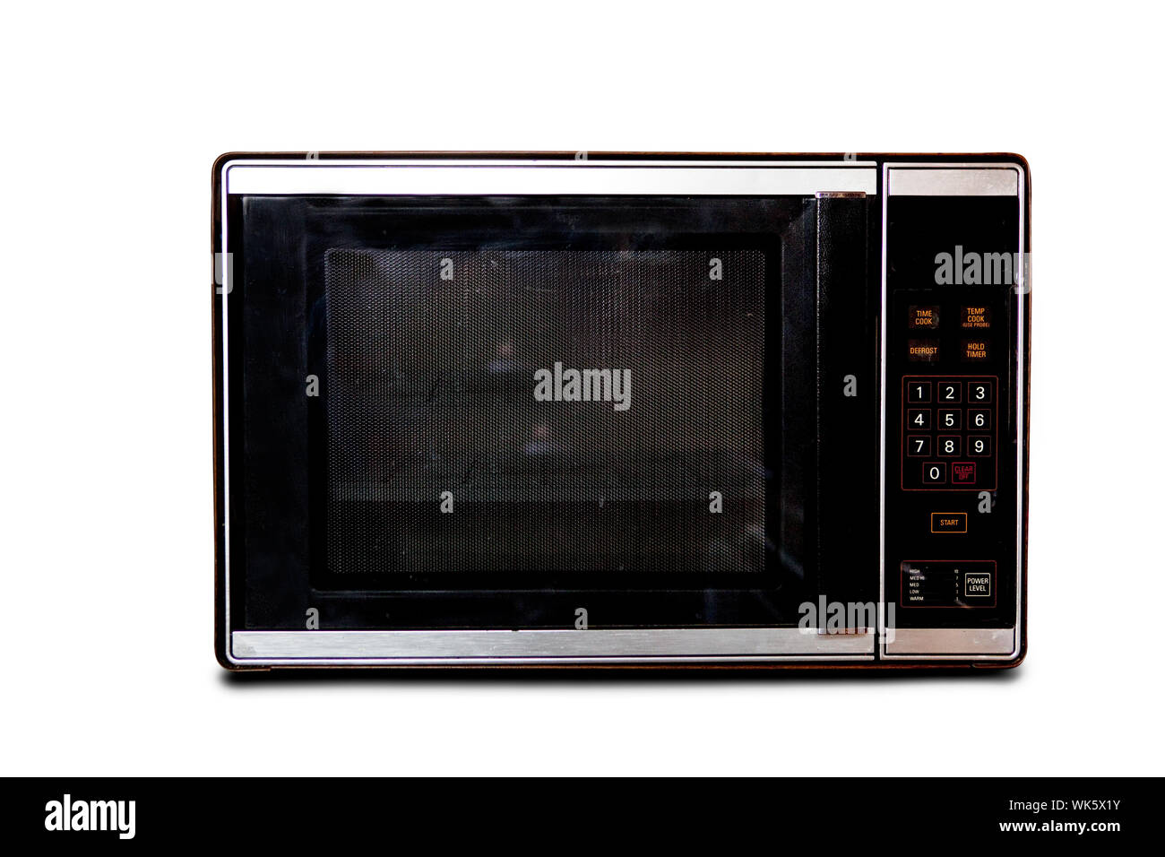 An old microwave isolated on white Stock Photo Alamy