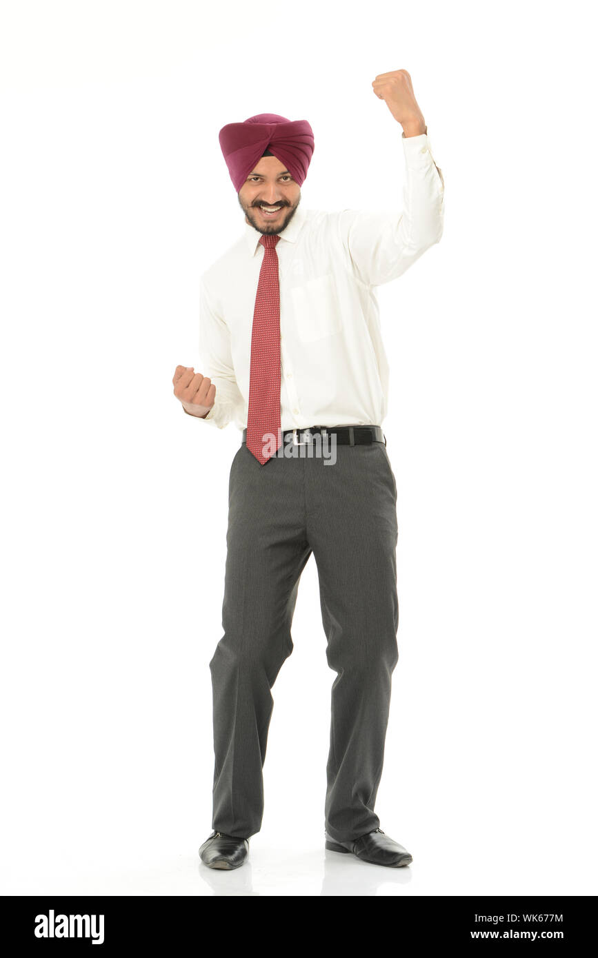 Businessman celebrating his success and smiling Stock Photo - Alamy