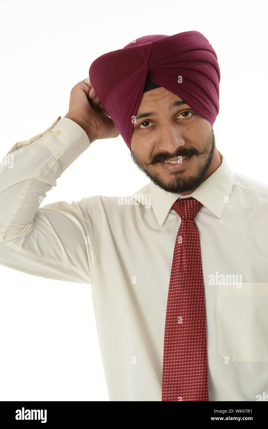 Businessman scratching his head and looking confused Stock Photo