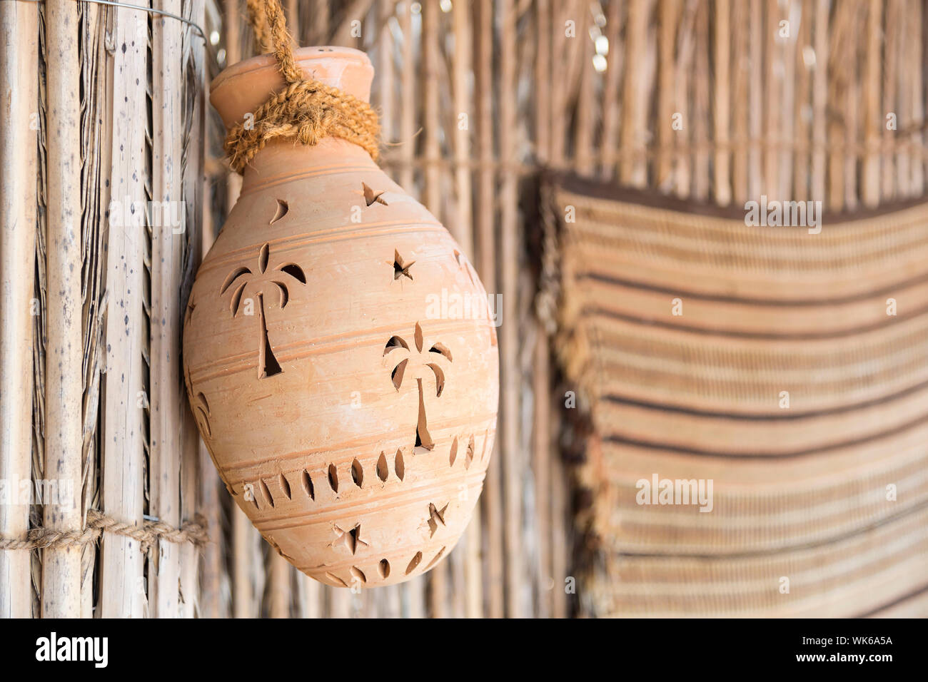 Hanging clay pot in desert camp Oman Stock Photo Alamy
