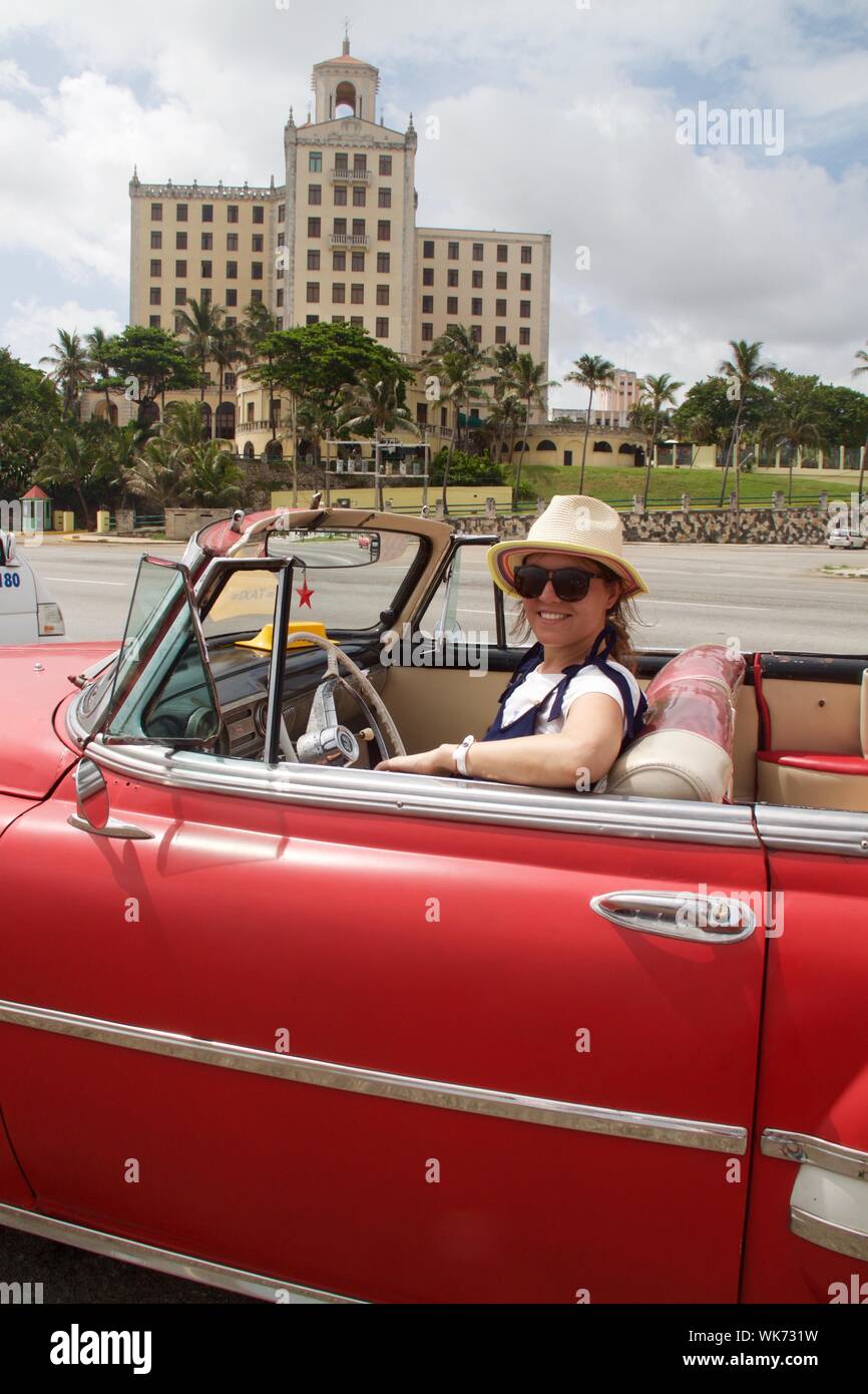 Young woman in red convertible hi-res stock photography and images - Alamy