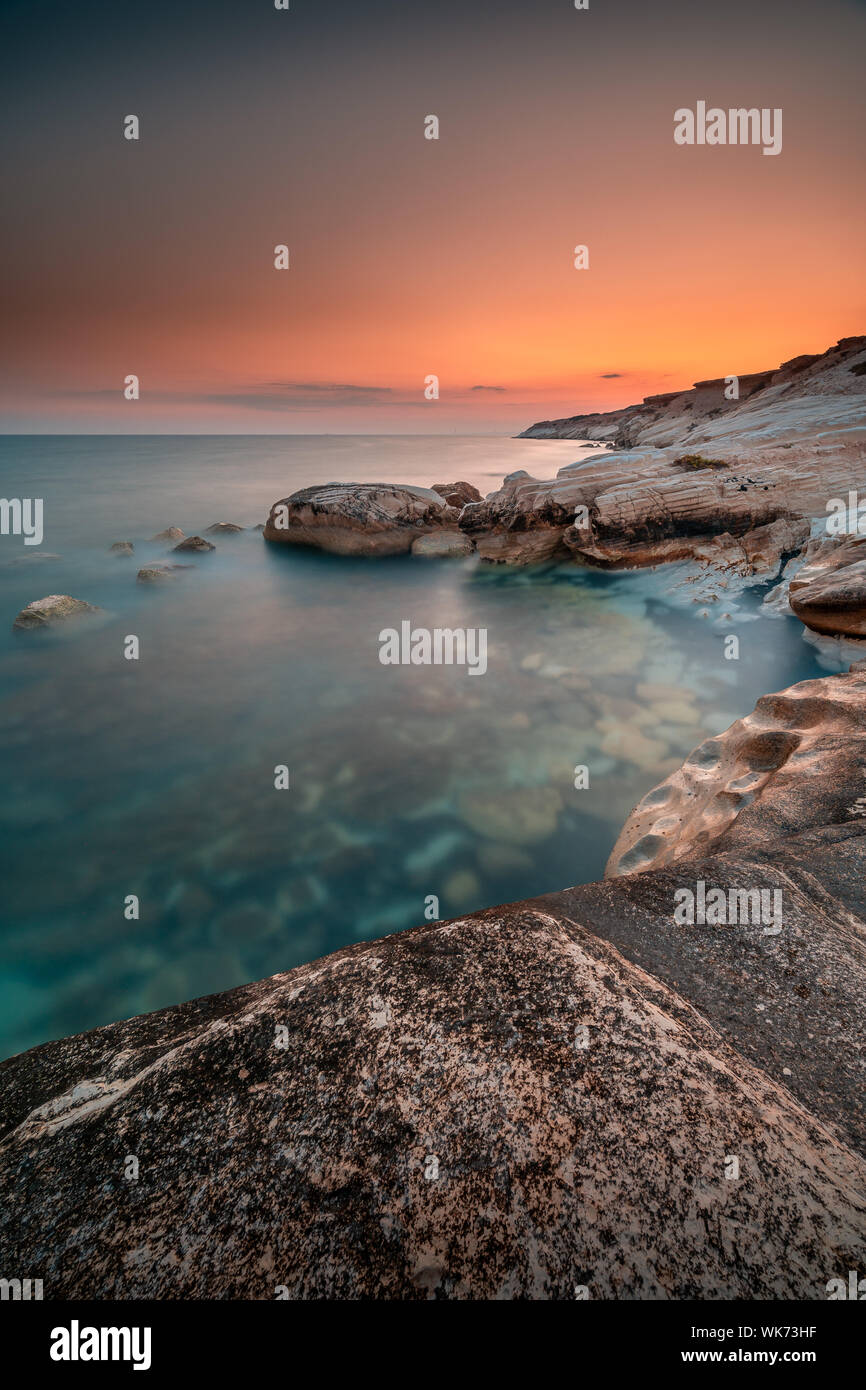 White stones beach near Limassol, Cyprus on a sunset Stock Photo