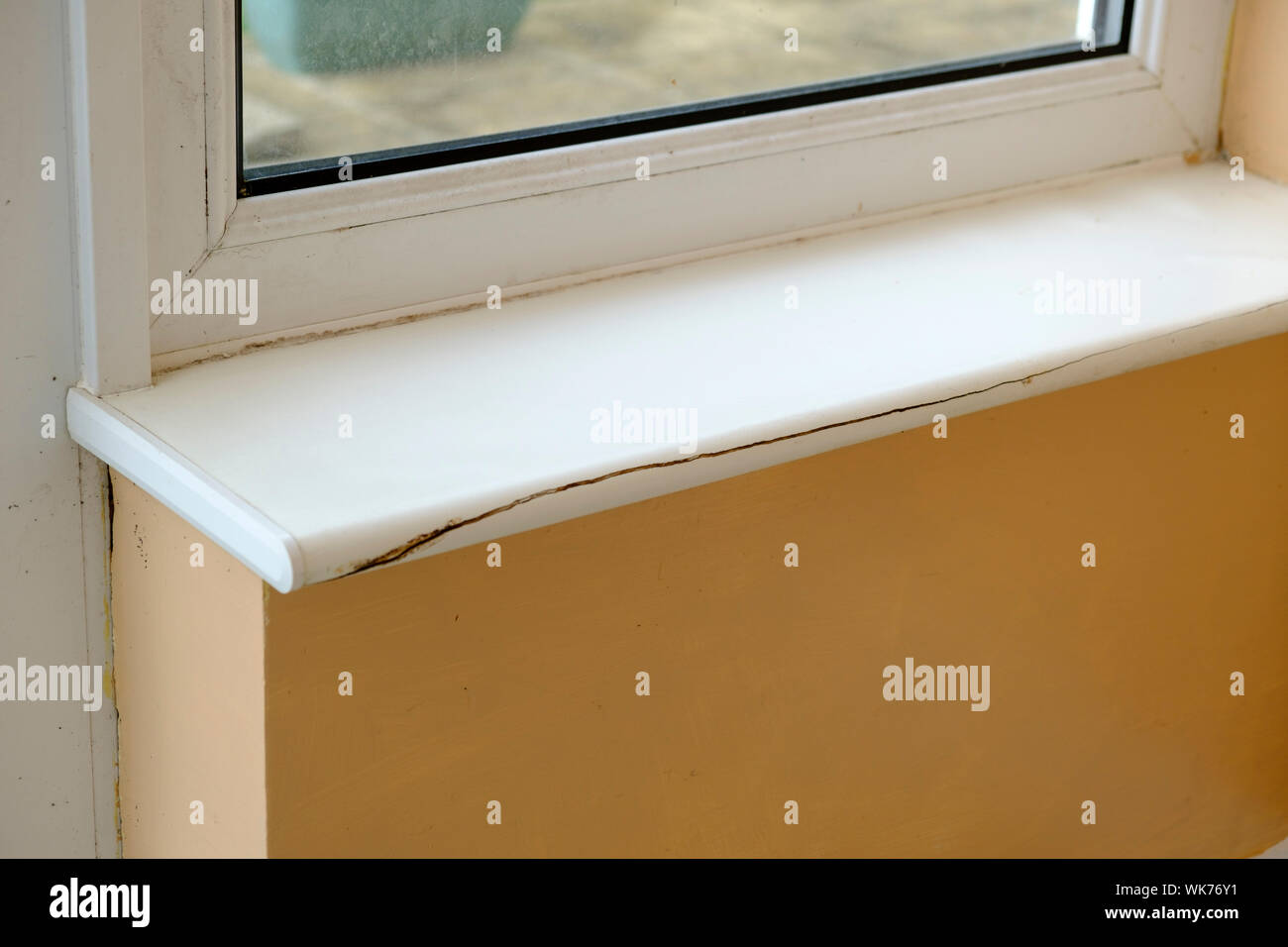 Empty room broken window cill Stock Photo