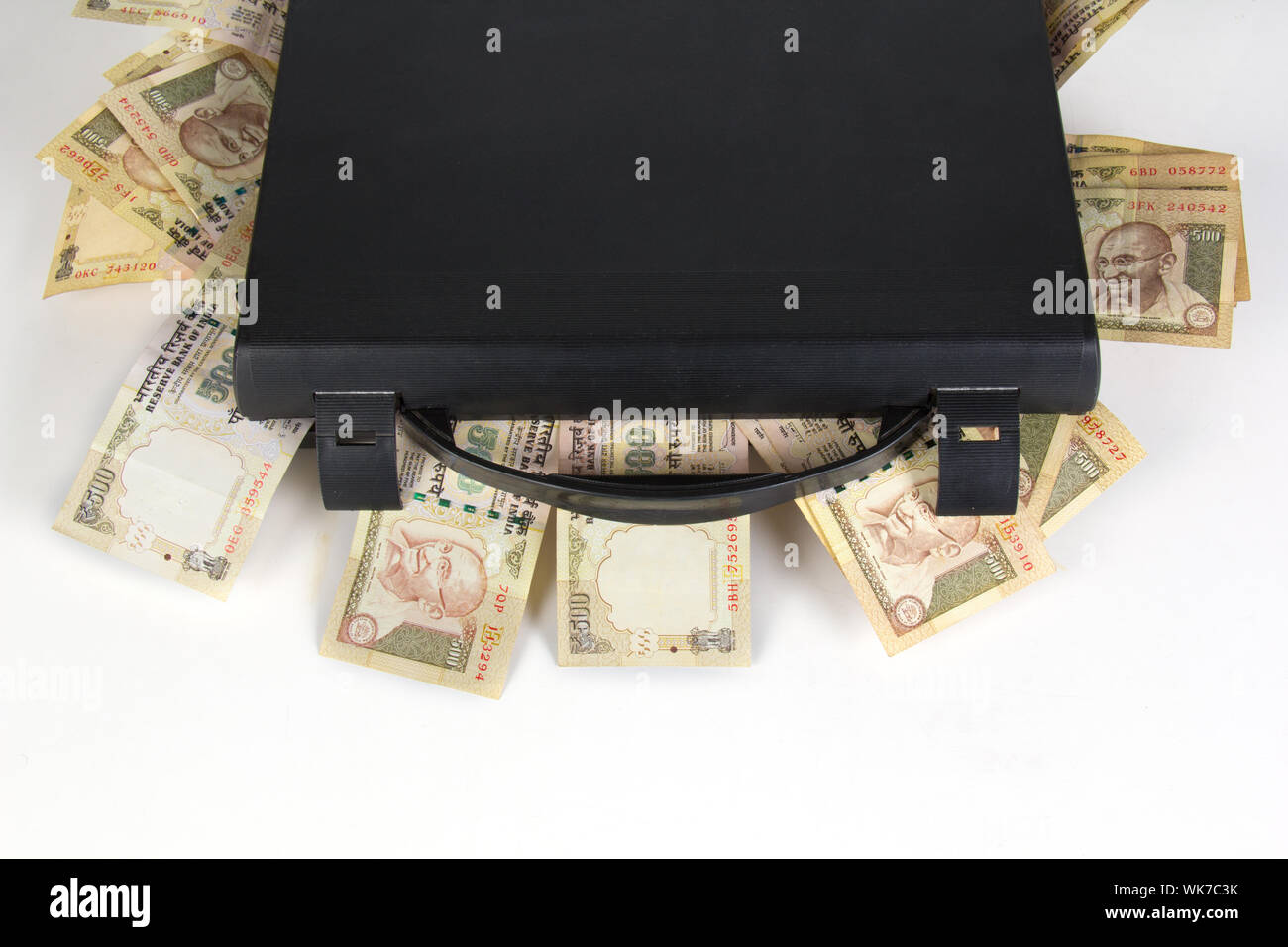 Briefcase full of money Stock Photo Alamy