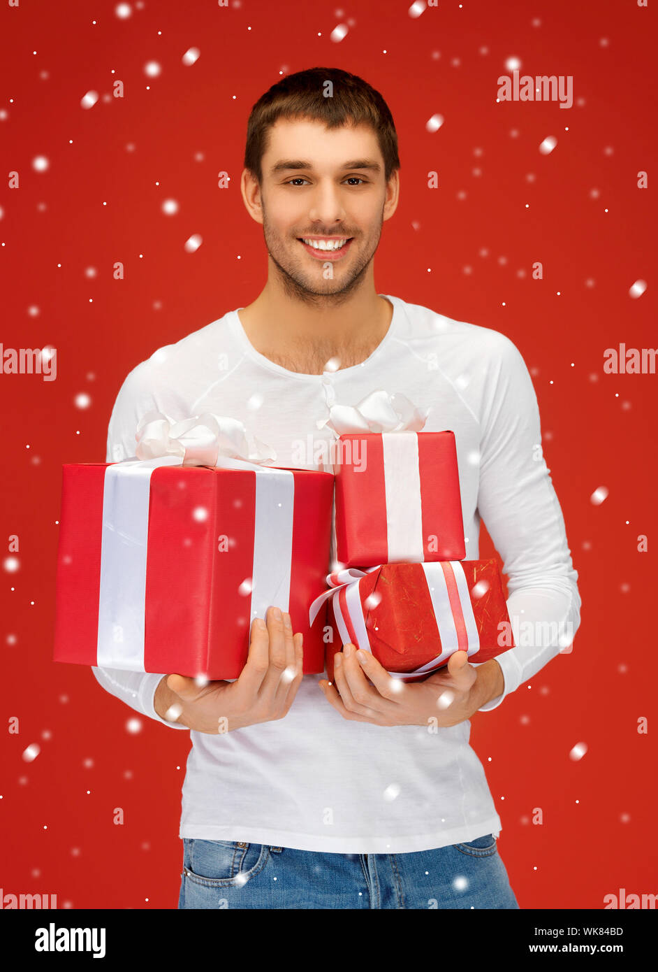 man holding many gift boxes Stock Photo