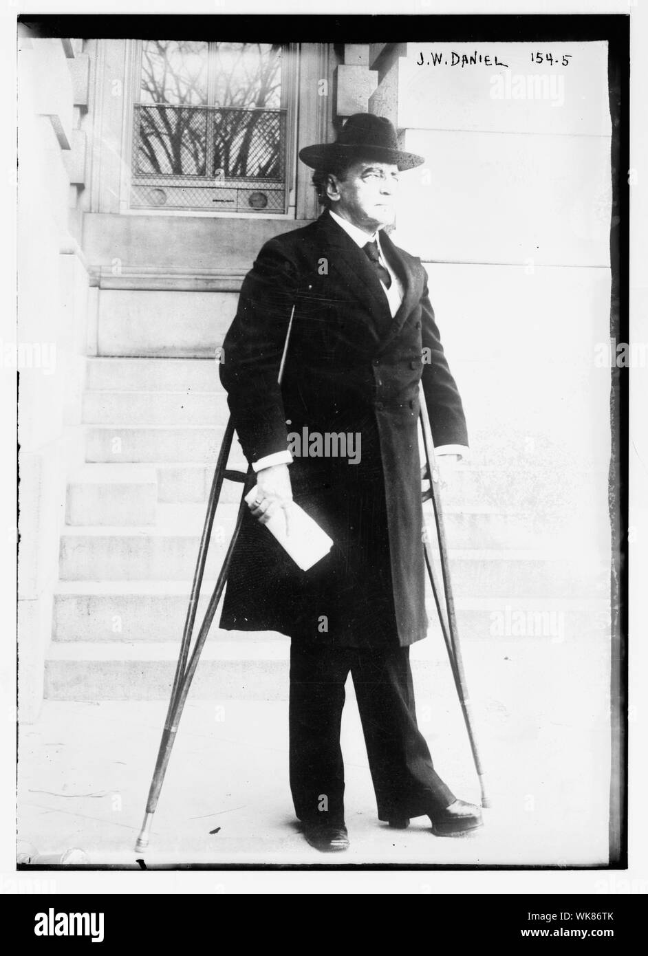 J.W. Daniel, on crutches Stock Photo Alamy