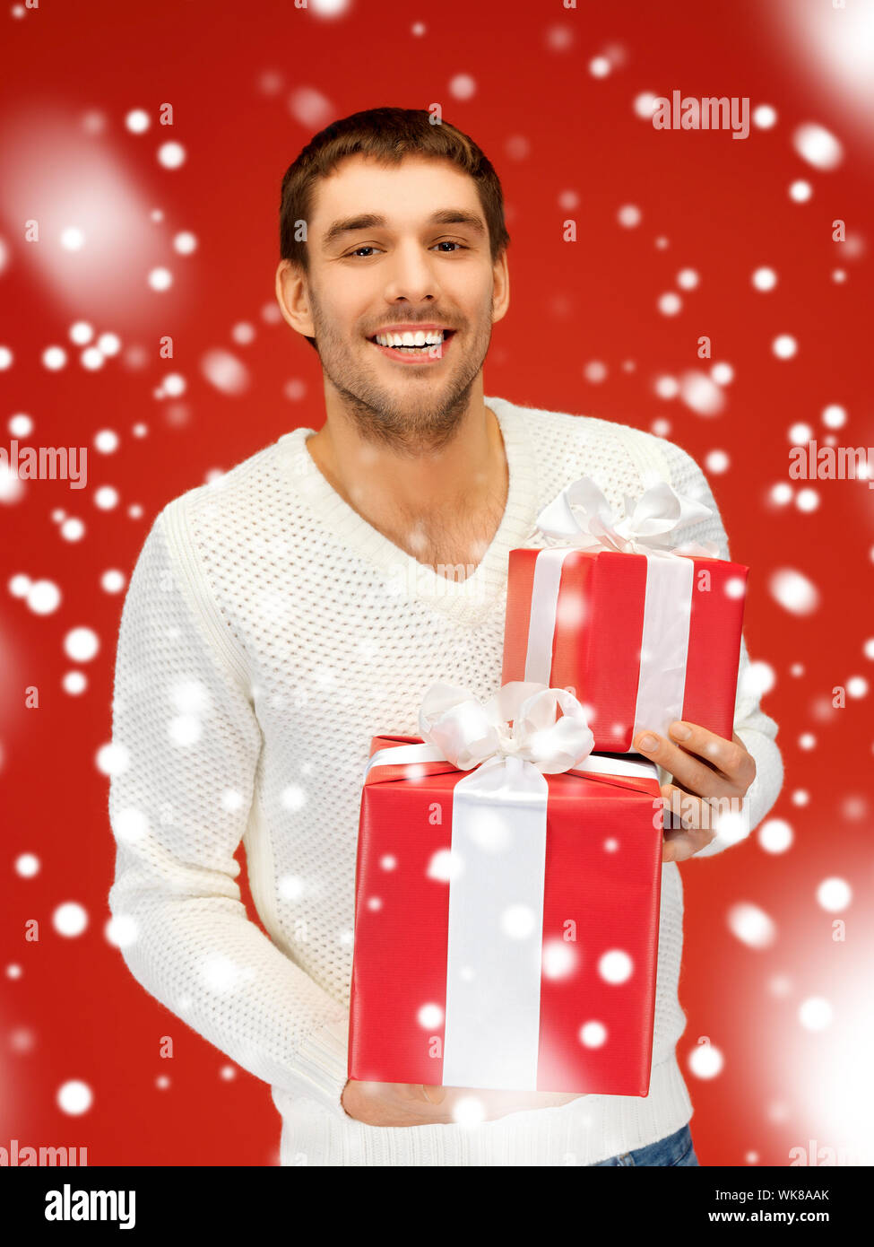 man holding many gift boxes Stock Photo