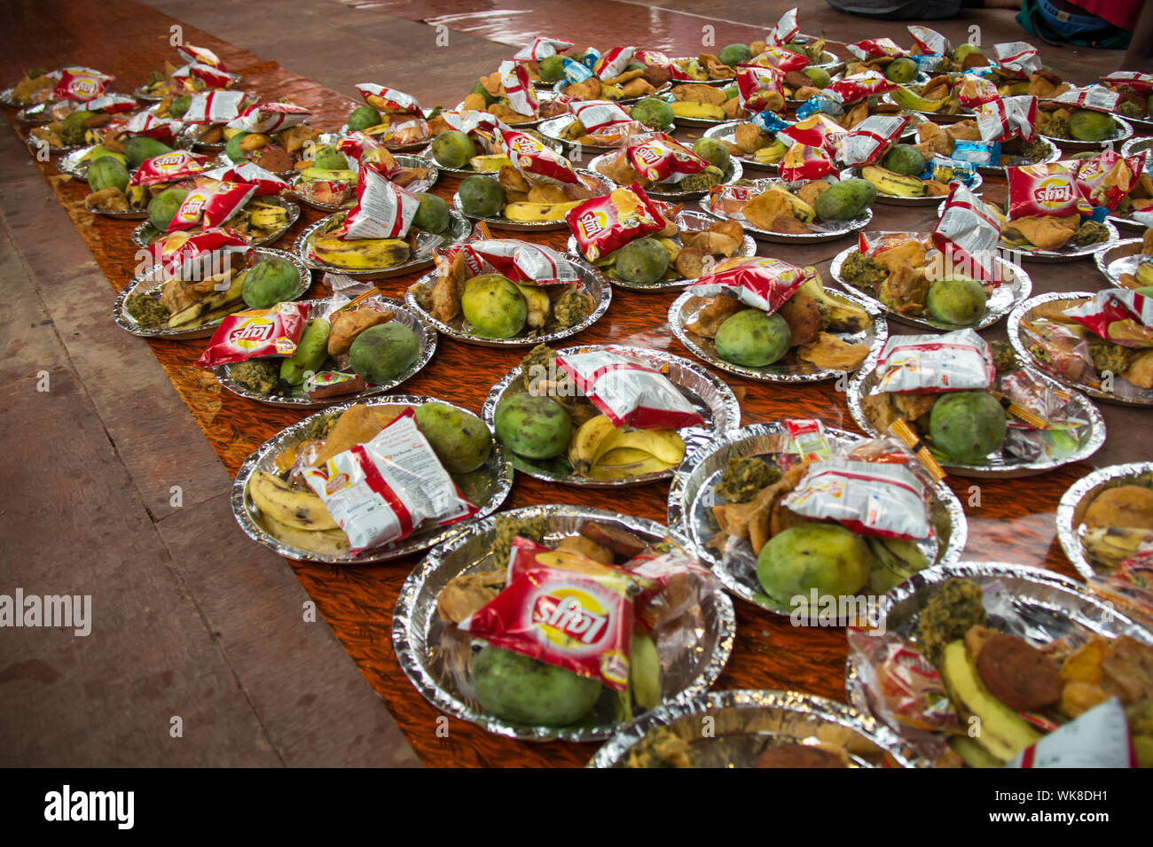 Plates of food arranged for Iftar at a mosque, Jama Masjid, Old Delhi