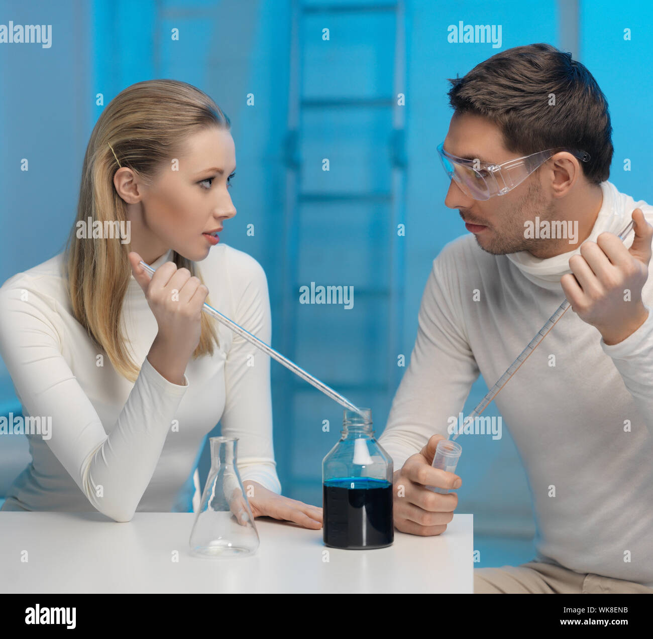 man and woman in laboratory Stock Photo