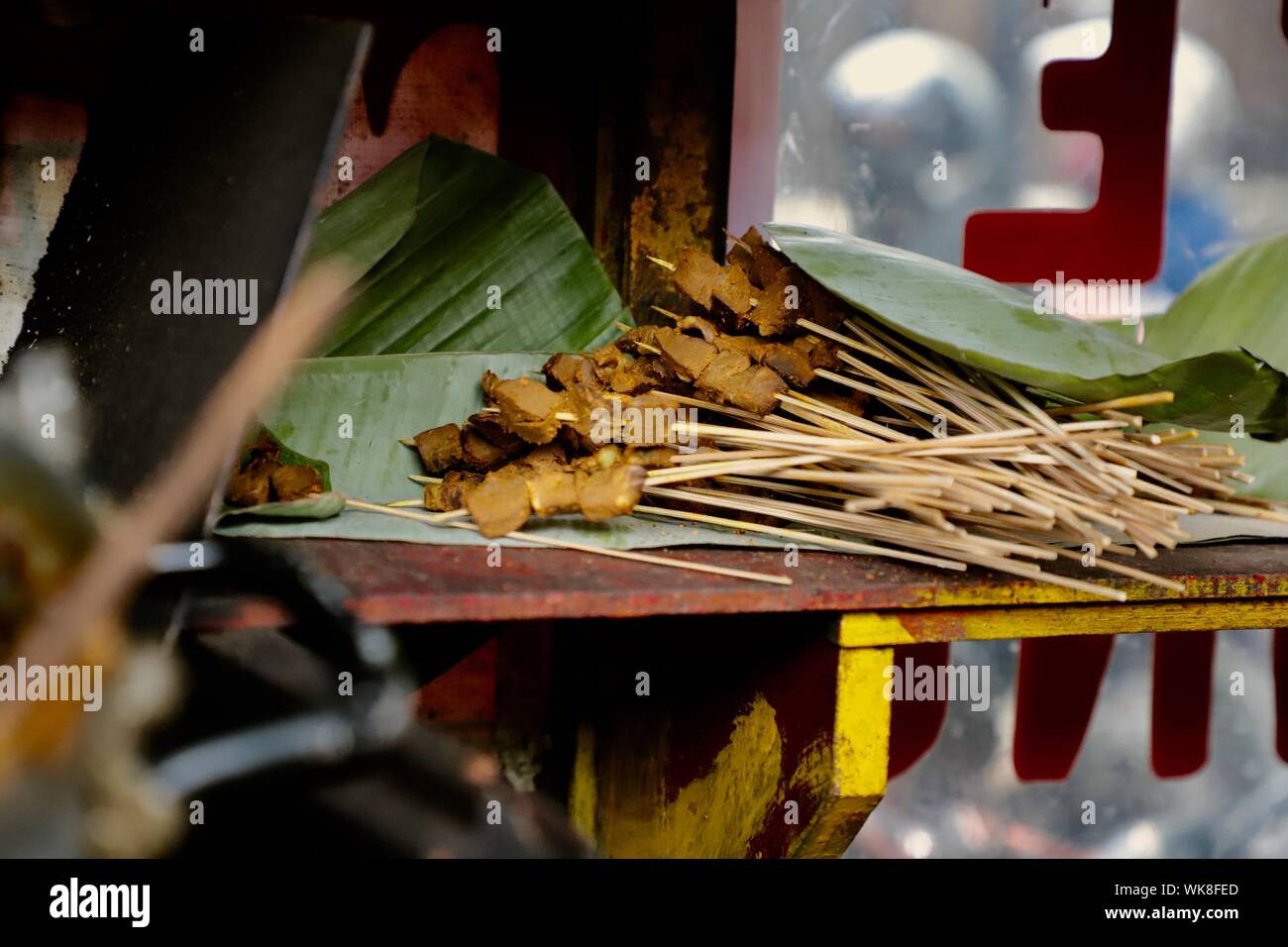 Sate Padang. Beef satay from Padang, West Sumatra. Half-cooked satay on shelf ready to be grilled. Stock Photo