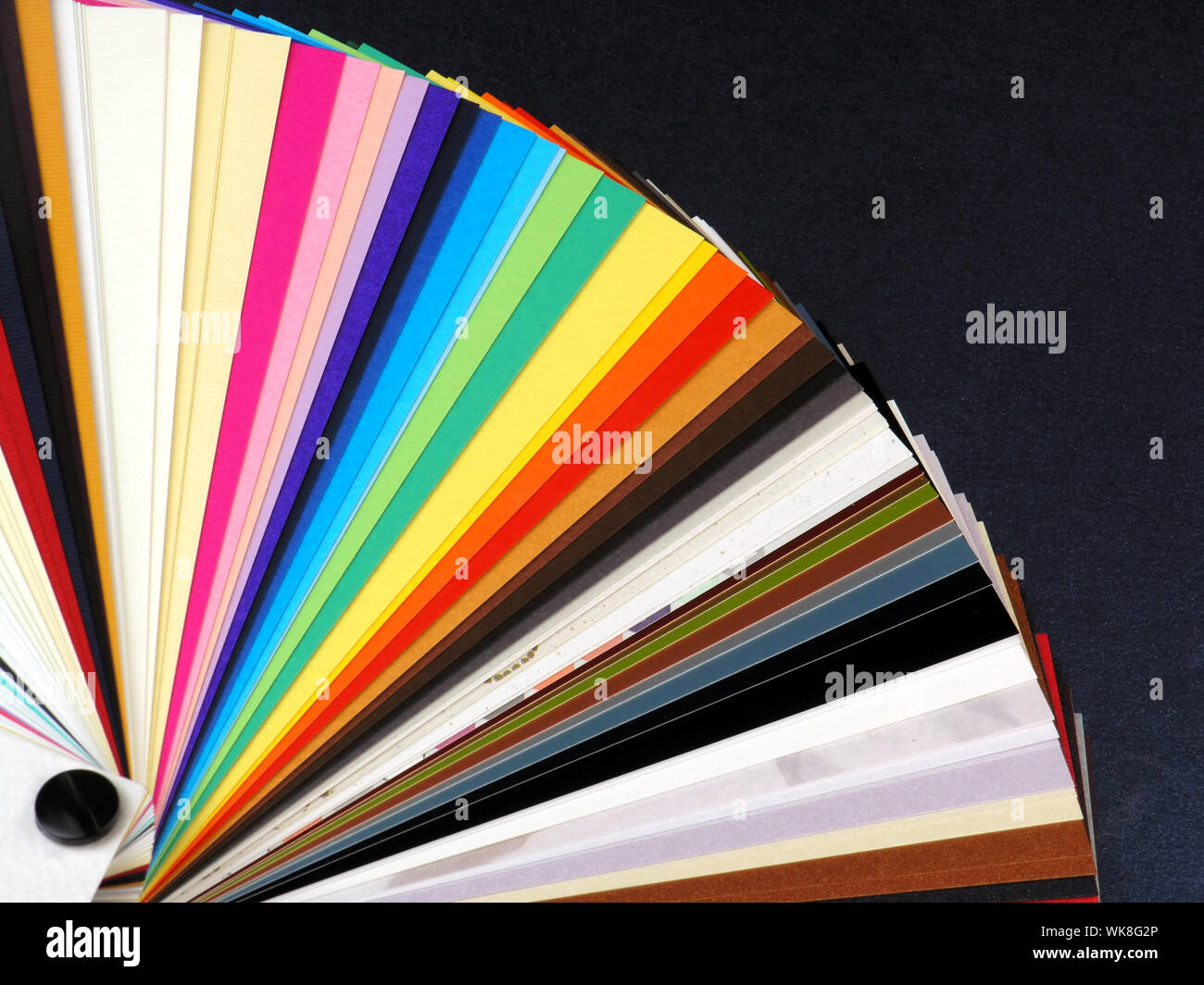 Colored samples of different papers on white background, business cards Stock Photo