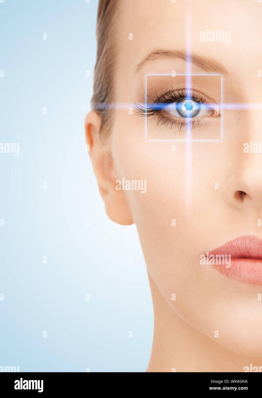 beautiful woman pointing to eye Stock Photo Alamy