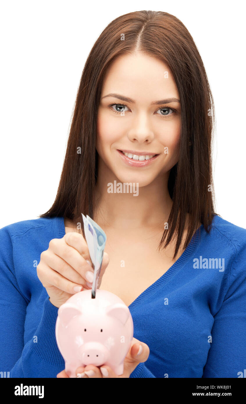 picture of lovely woman with piggy bank and money Stock Photo - Alamy