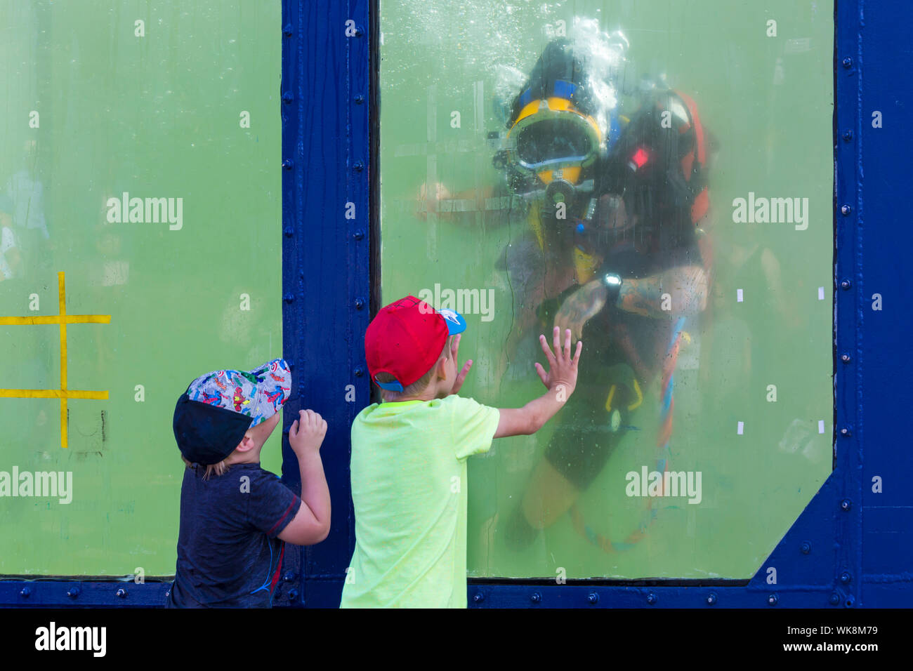 Diver in dive tank, diving tank, at Bournemouth Air Festival, Dorset UK