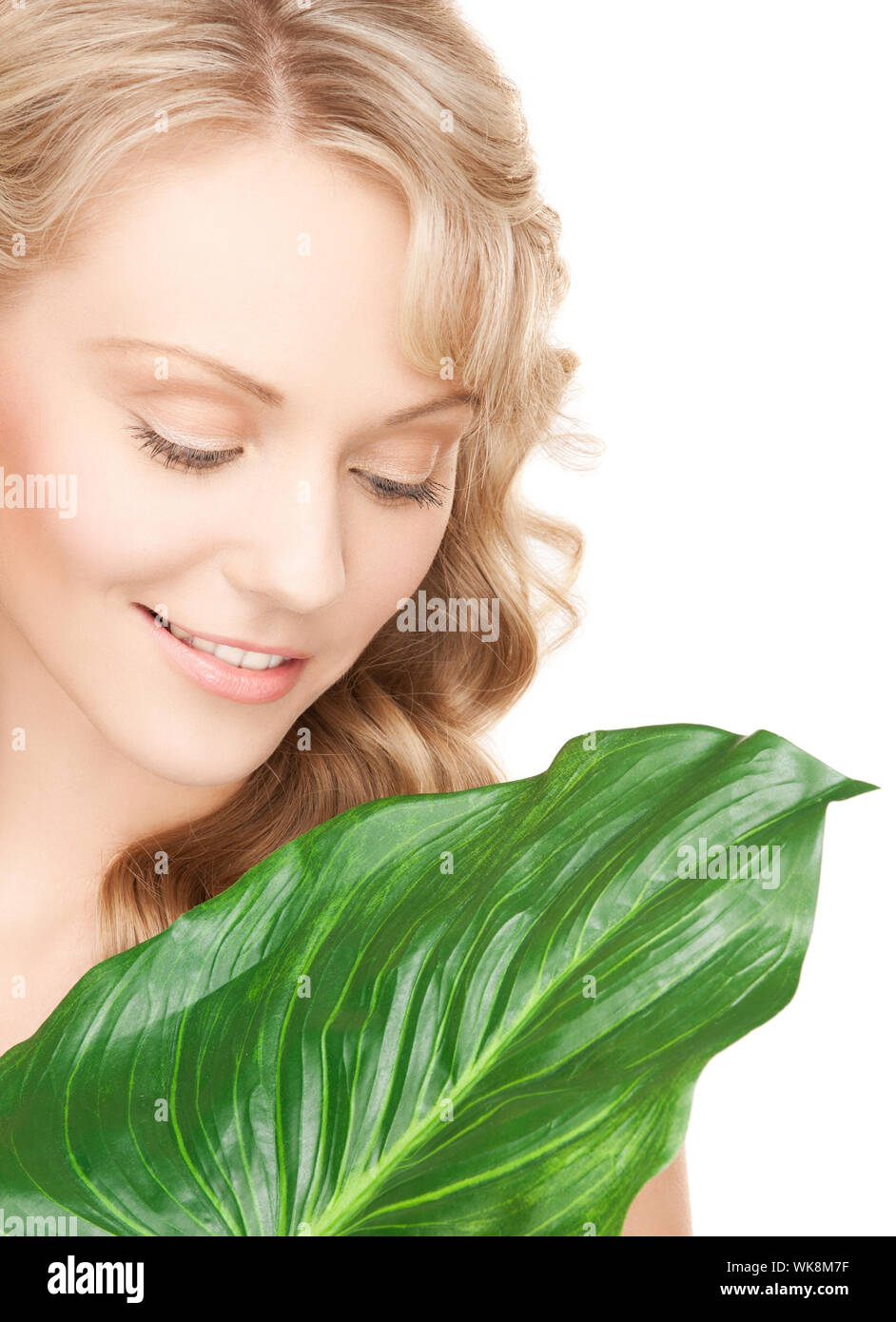 picture of woman with green leaf over white Stock Photo - Alamy