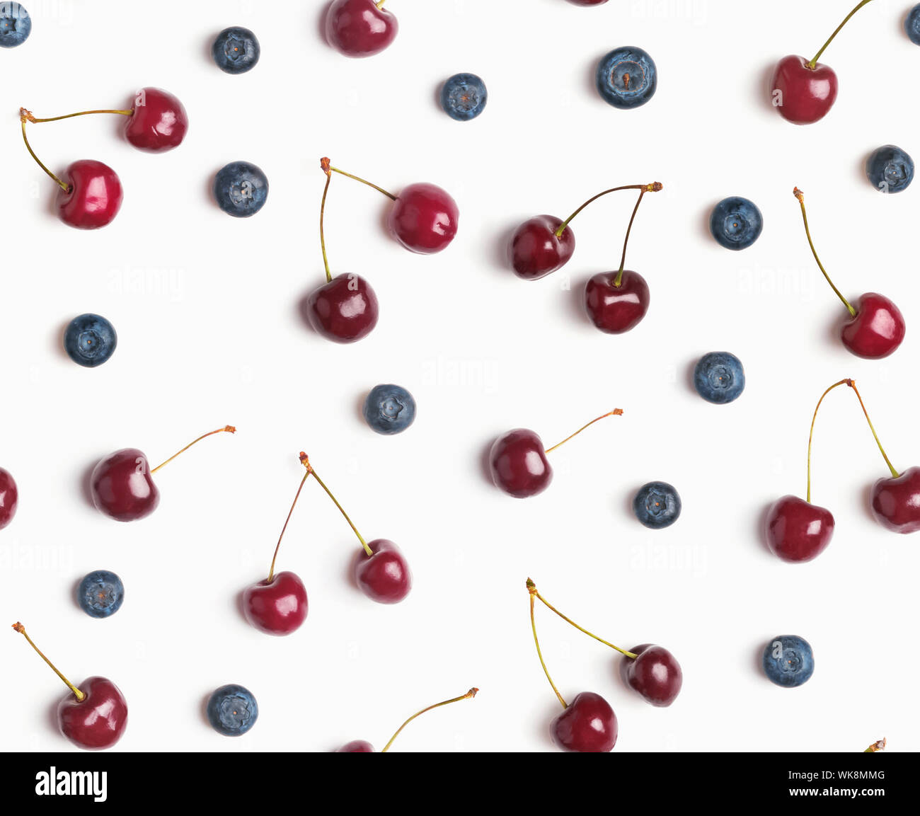 Cherries and blueberries on the white background, seamless pattern