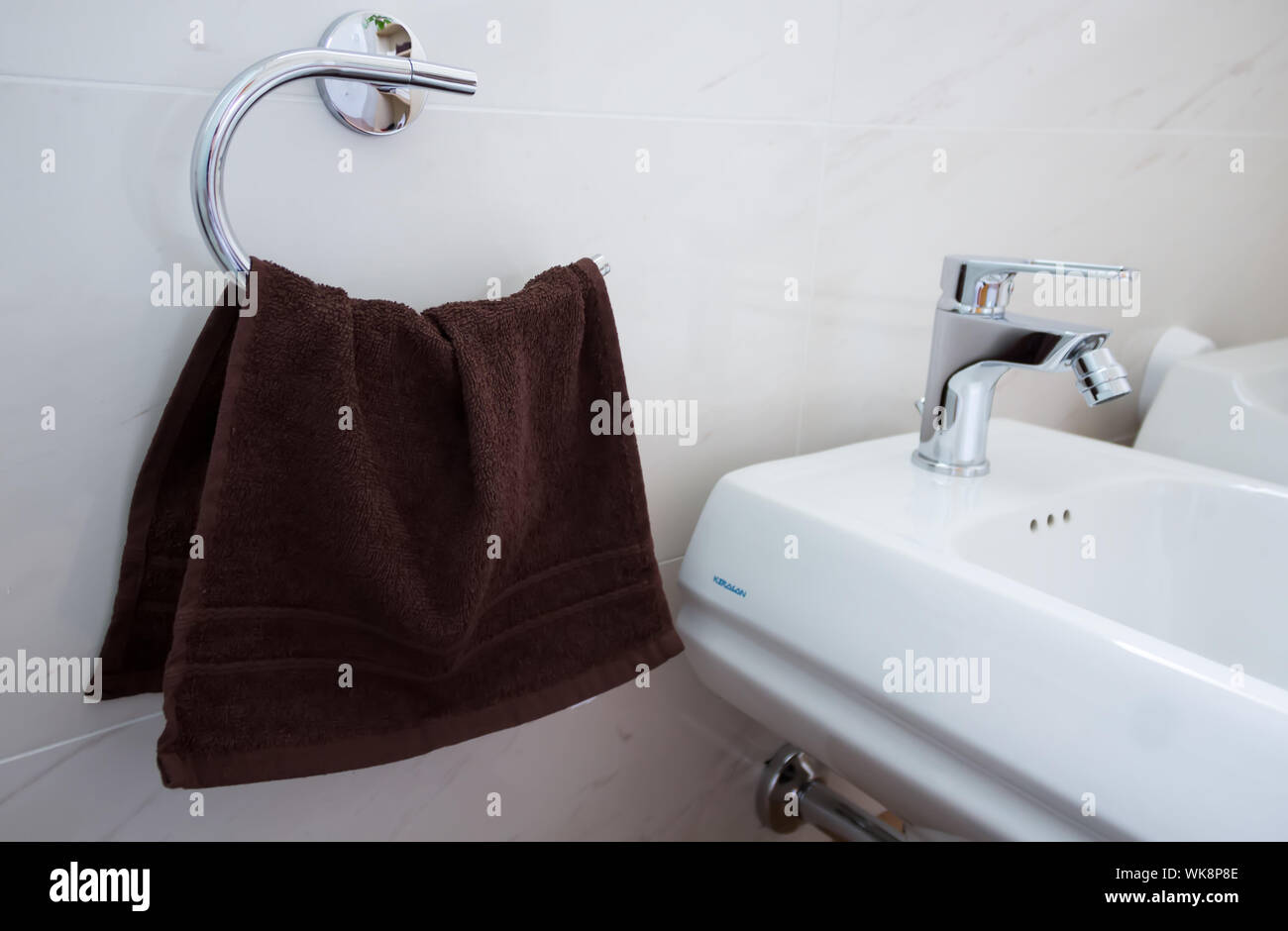 Bidet and towels in the bathroom Stock Photo Alamy