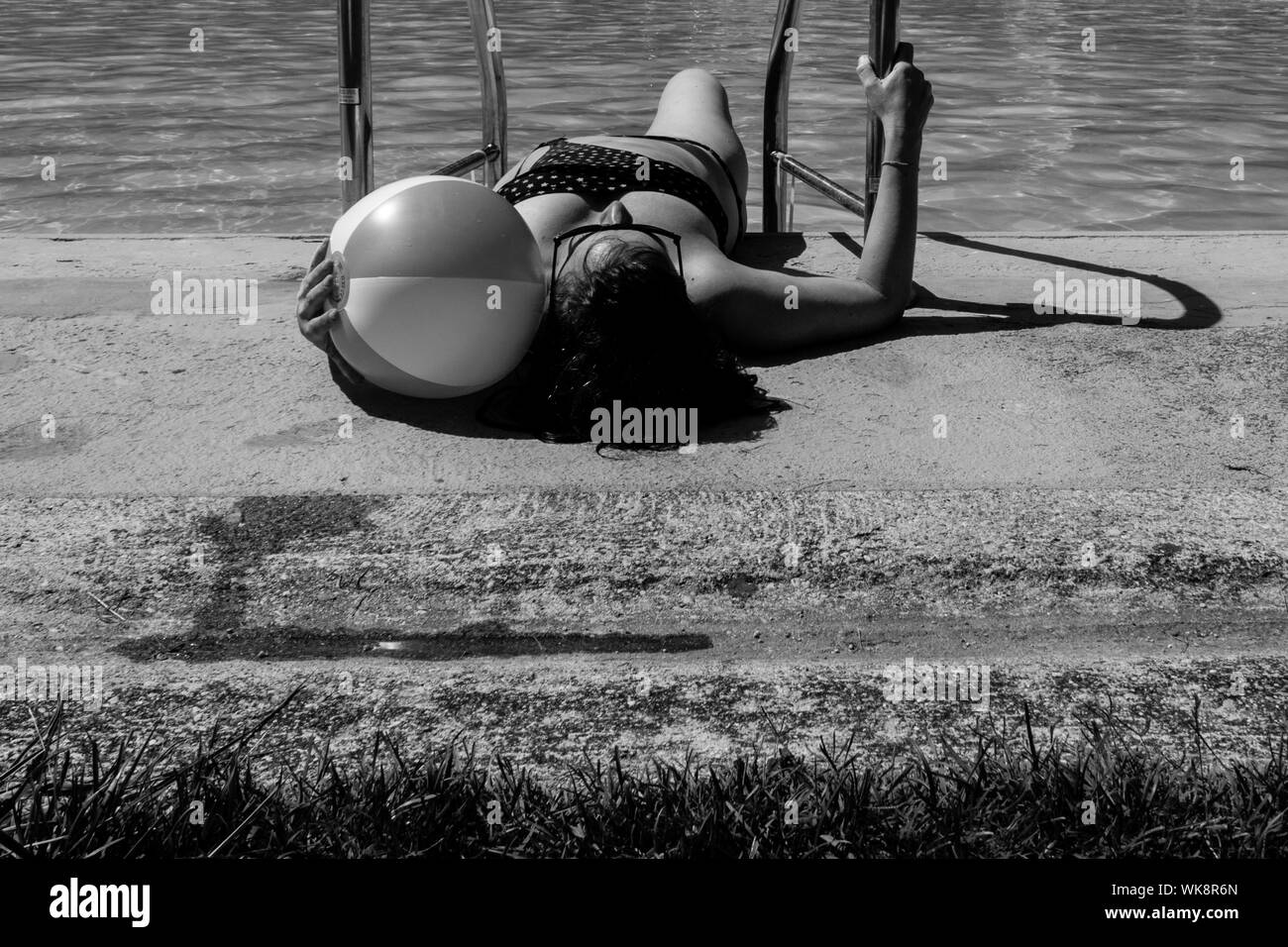 Woman bikini lying down Black and White Stock Photos & Images Alamy