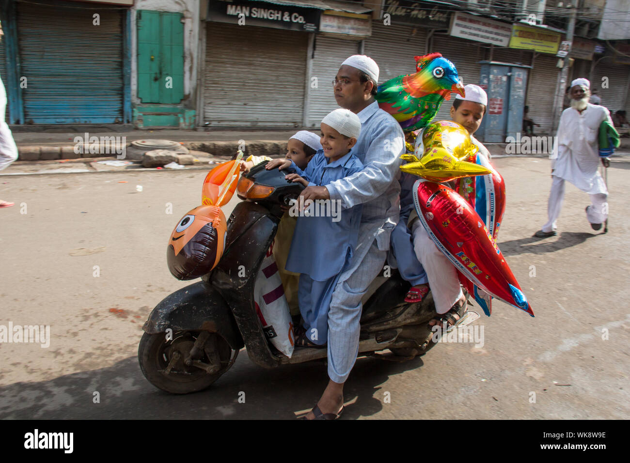 Family on scooter, New Delhi, India Stock Photo Alamy