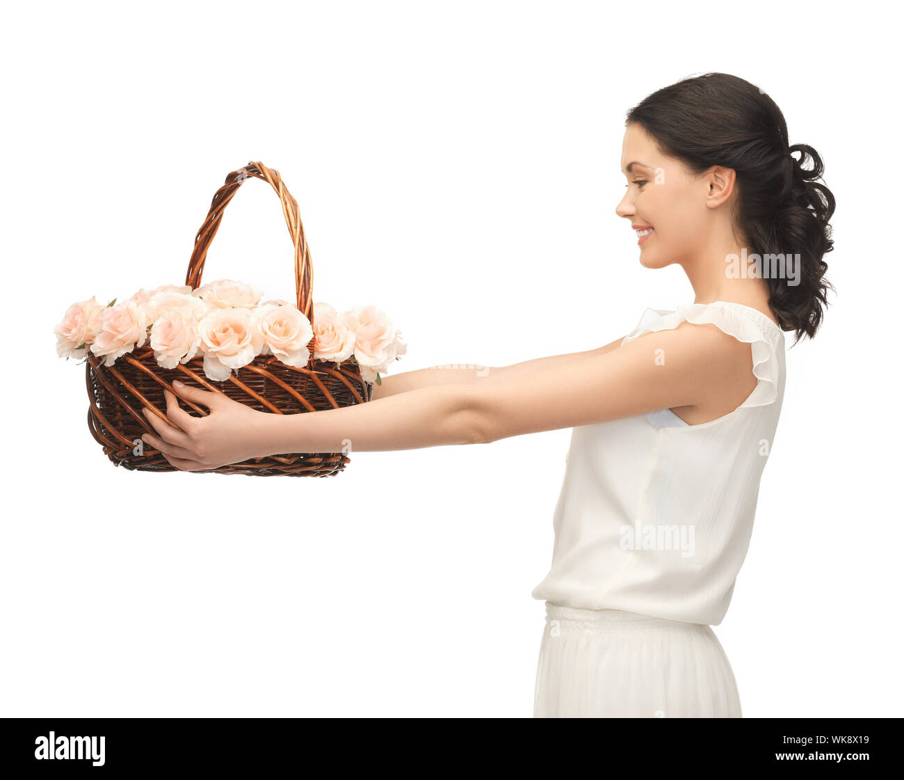 picture of young woman with basket full of flowers Stock Photo - Alamy