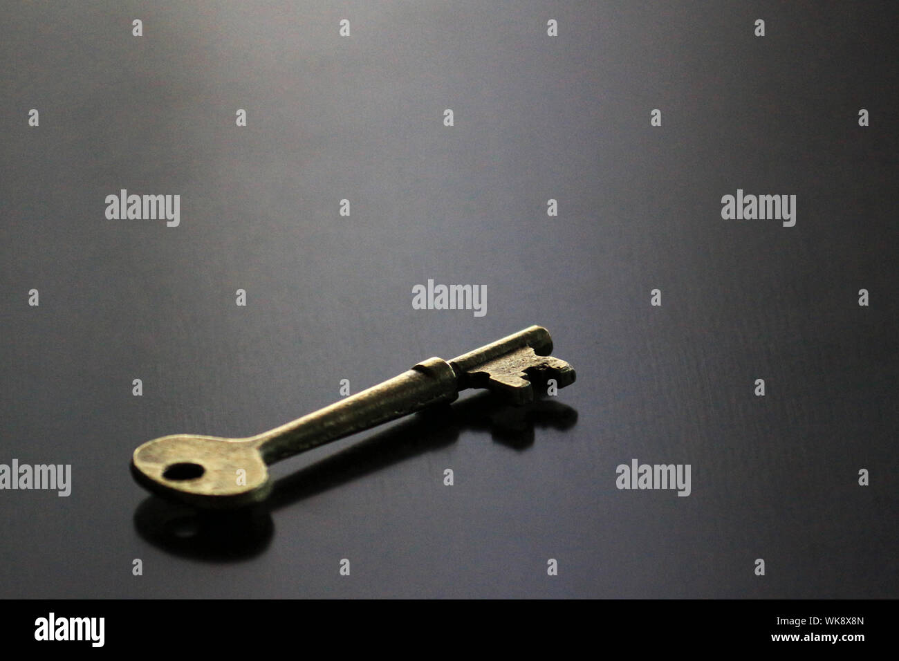 Still life of antique brass key Stock Photo Alamy