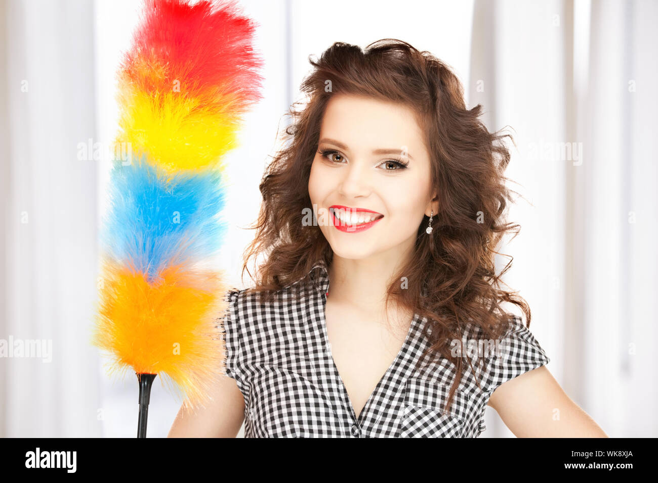 beautiful woman with cleaning sweep Stock Photo Alamy