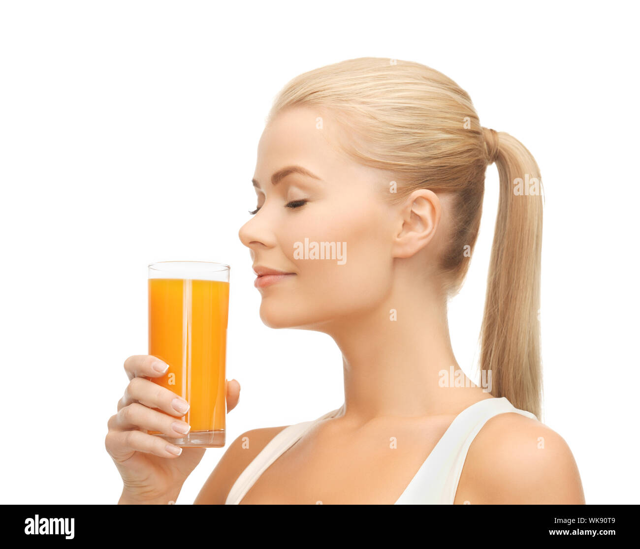 picture of young woman drinking orange juice Stock Photo Alamy