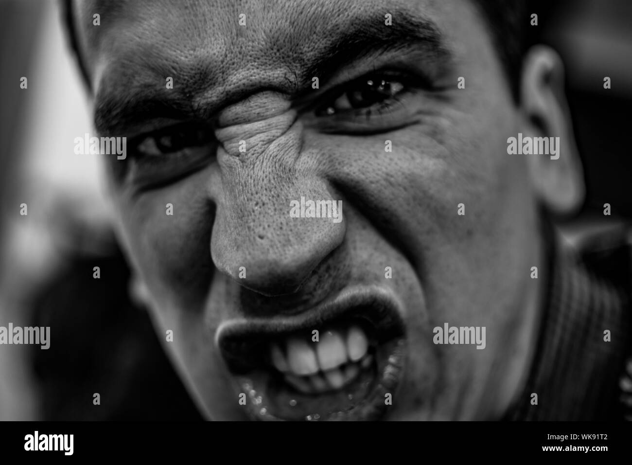 Close up Portrait Of Angry Young Man Stock Photo Alamy