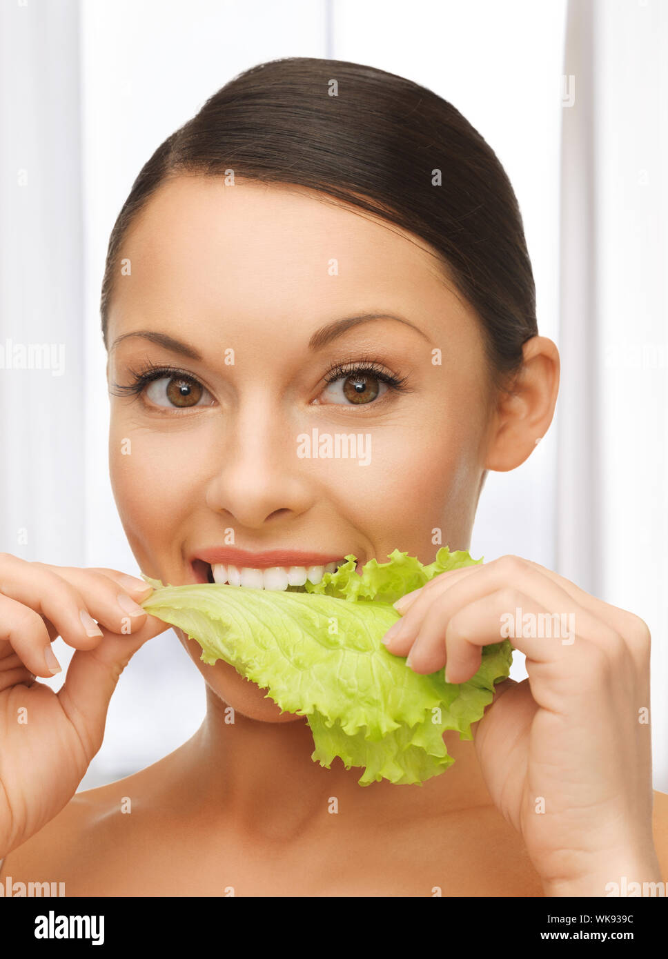 woman with lettuce Stock Photo Alamy