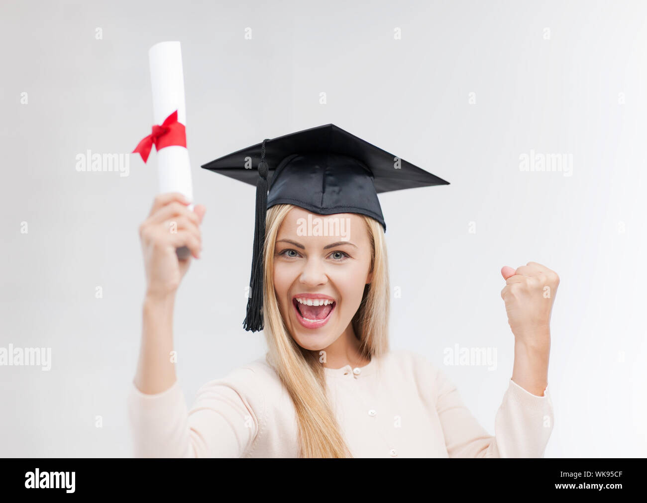 student in graduation cap with certificate Stock Photo Alamy