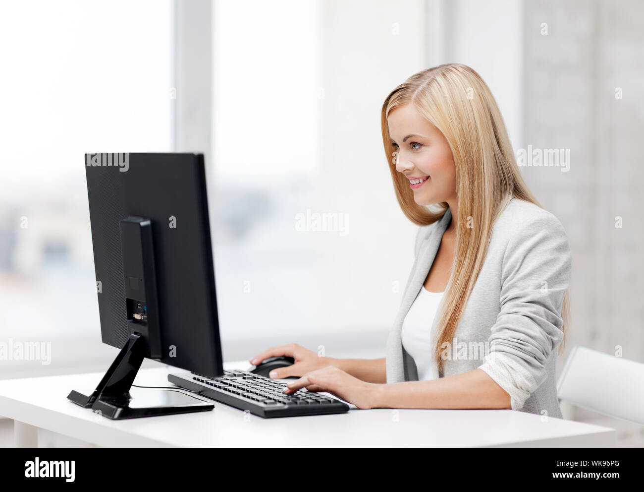 businesswoman with computer Stock Photo