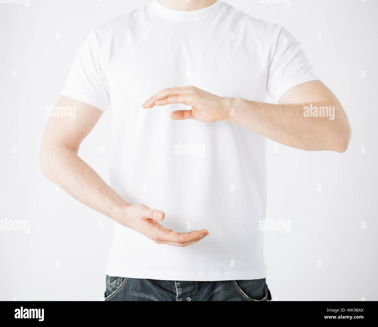 close up of mans hands showing something Stock Photo