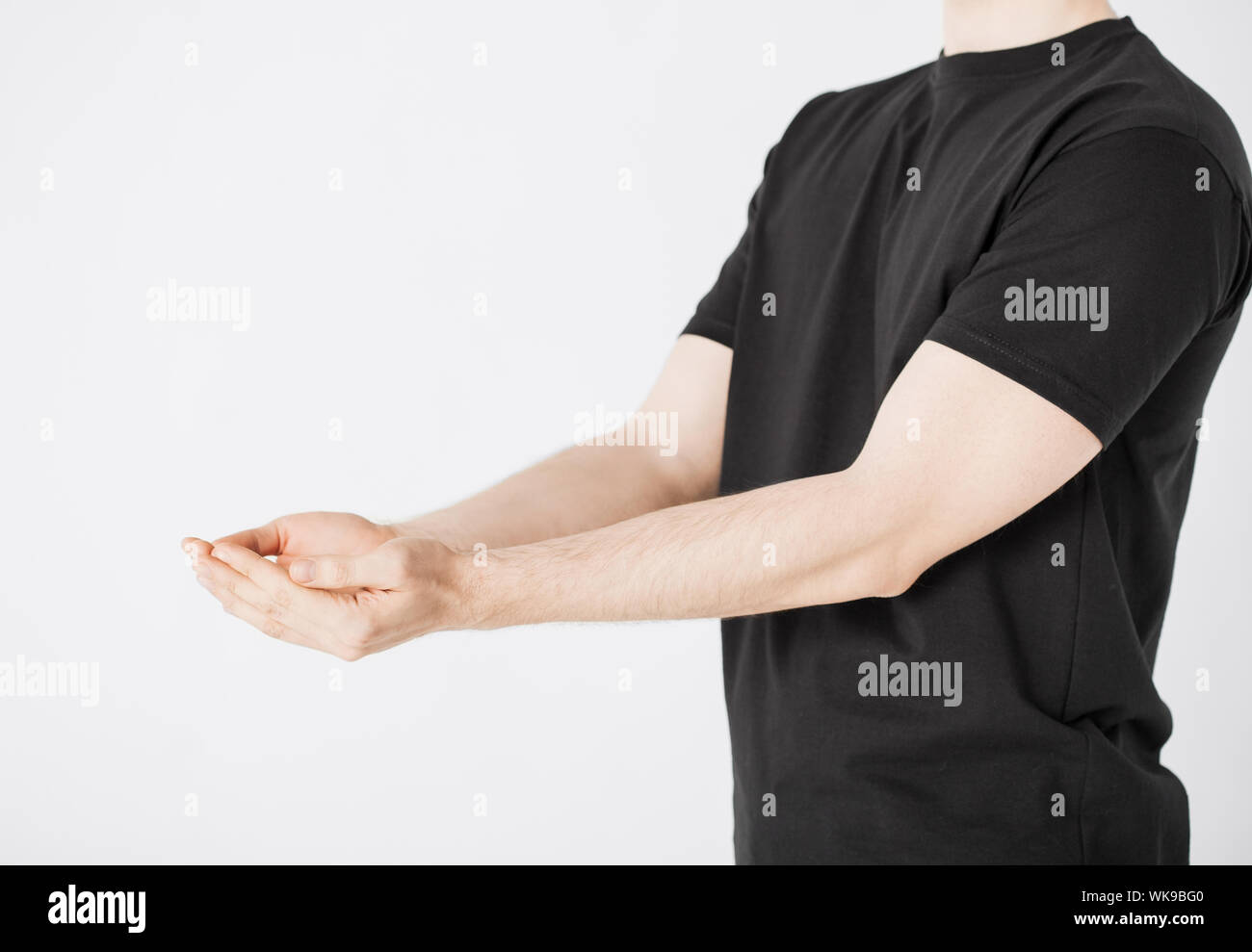 mans hands showing something Stock Photo