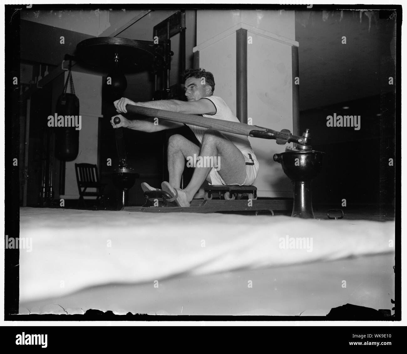 James A. Shanley, D. of New Haven, Conn. ... rowing machine at the House gym Stock Photo