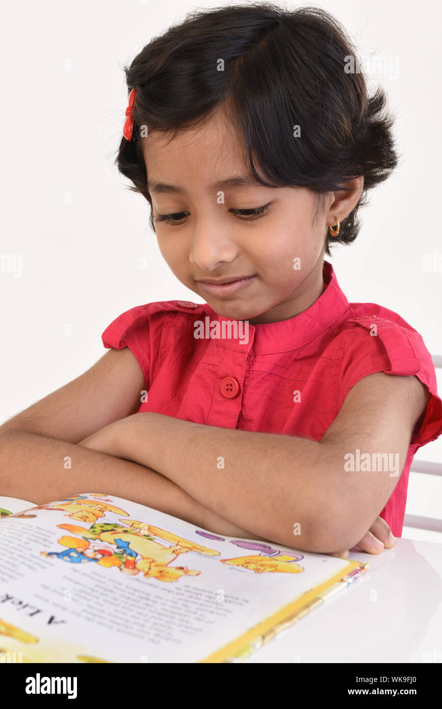 Indian girl reading a book hi-res stock photography and images - Alamy