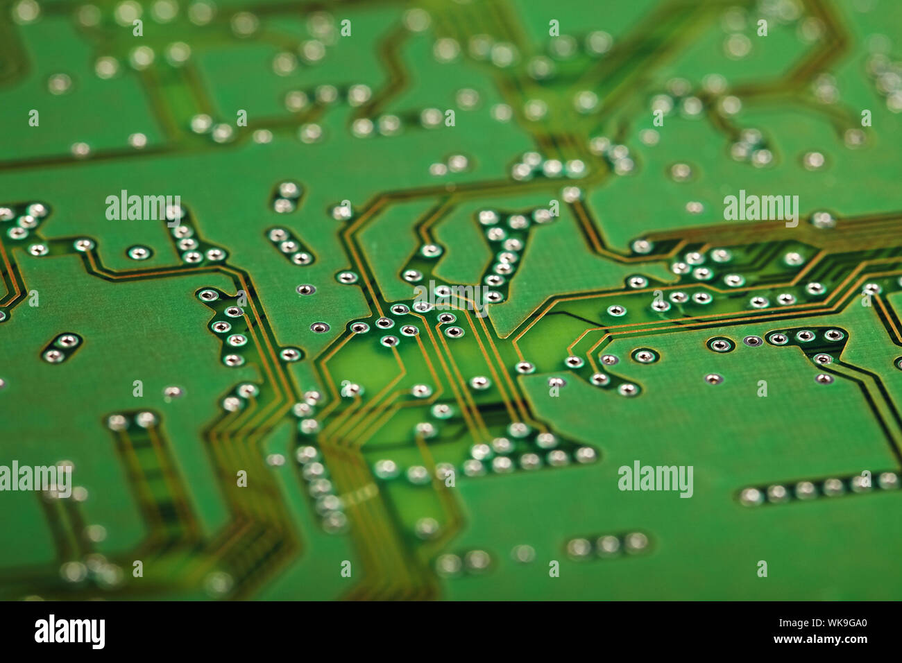 Circuit board close up - a green industrial background Stock Photo - Alamy