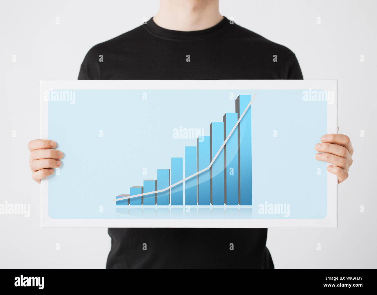 woman holding board with 3d graph Stock Photo