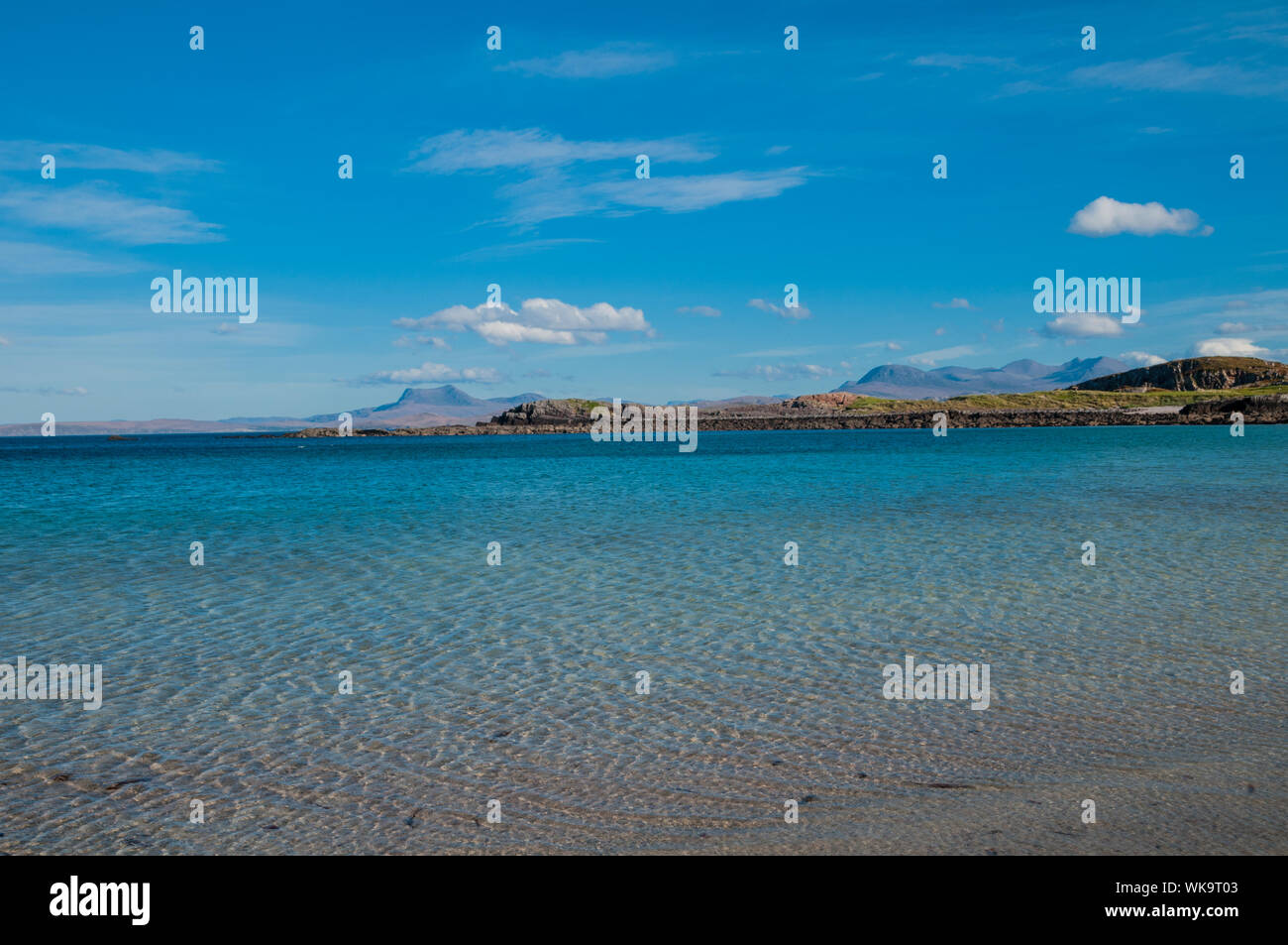 Sea at mellon Udrigle with Beinn Ghoblach in background with Gruinard Bay nr Laide Ross & Cromarty Highland Scotland Stock Photo