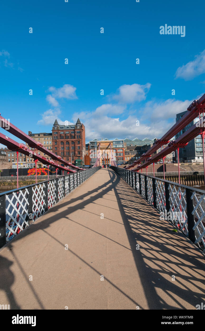 Suspension bridge over the River Clyde between Carlton Place and Clyde Street Glasgow Scotland Stock Photo