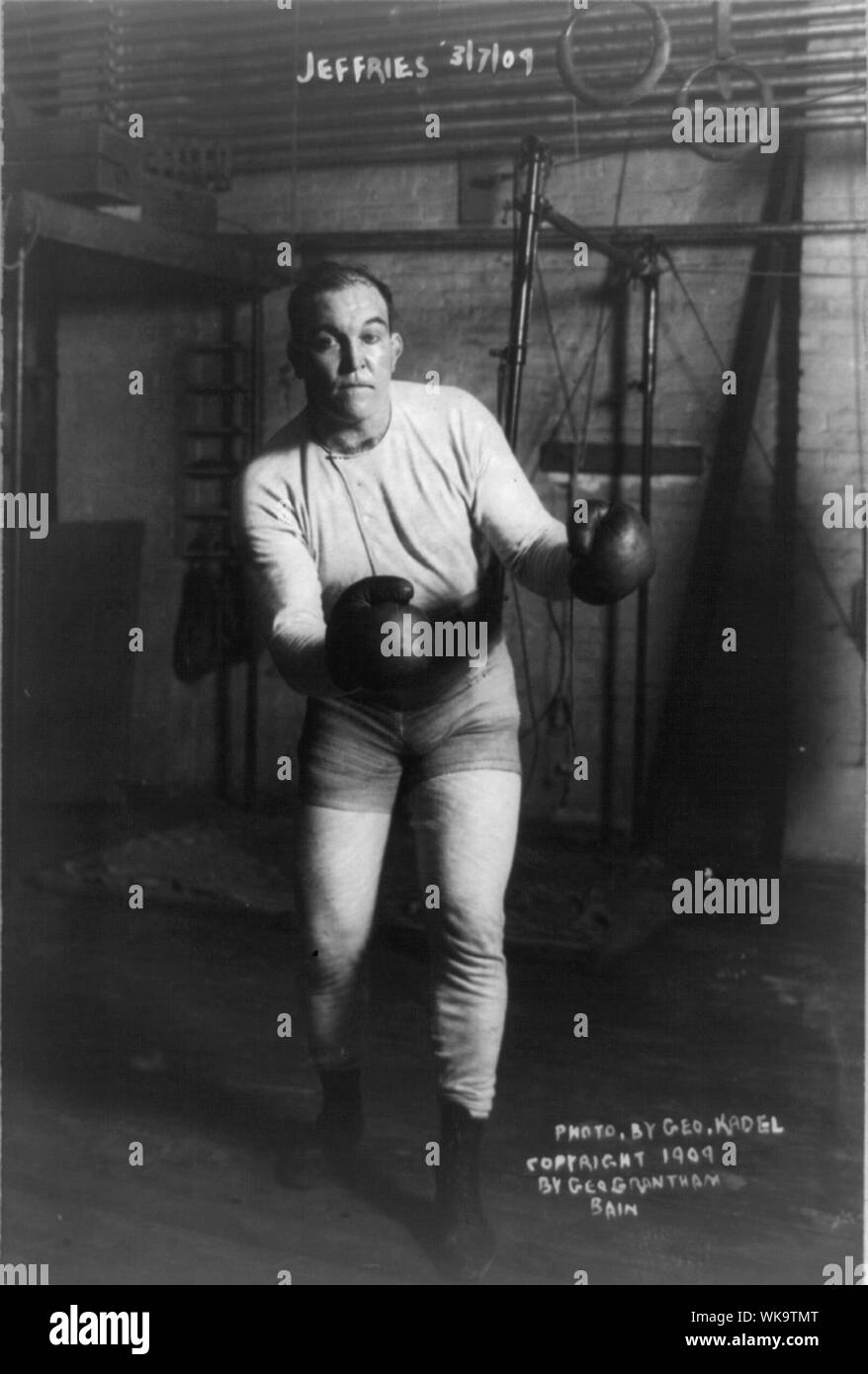 James J. Jeffries, full-length portrait, standing, facing front; in boxing pose Stock Photo