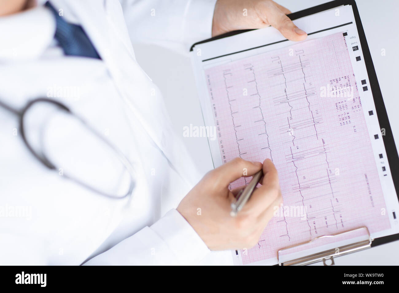 male doctor hands with cardiogram Stock Photo - Alamy