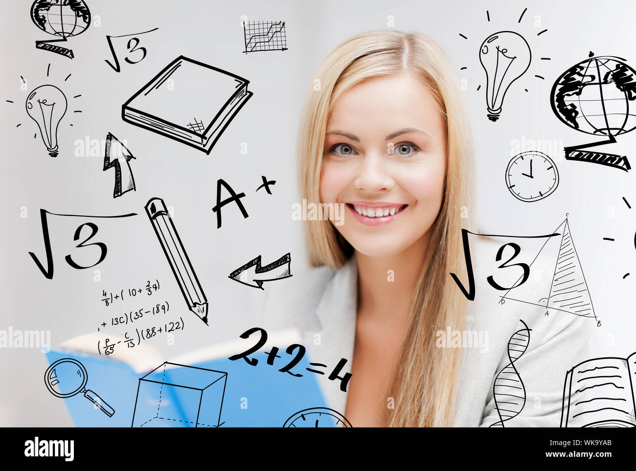 student with doodles reading book Stock Photo