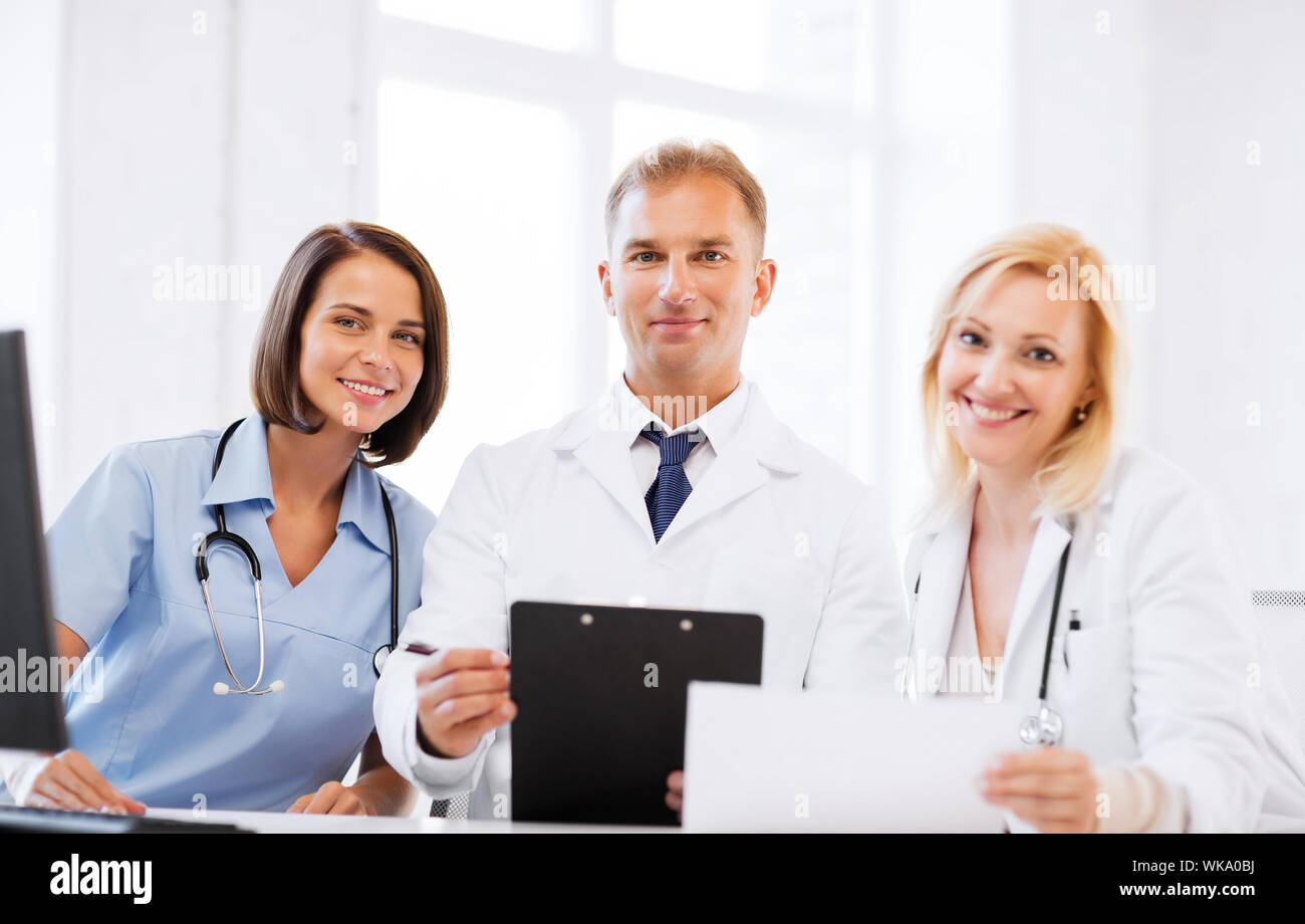 team or group of doctors on meeting Stock Photo