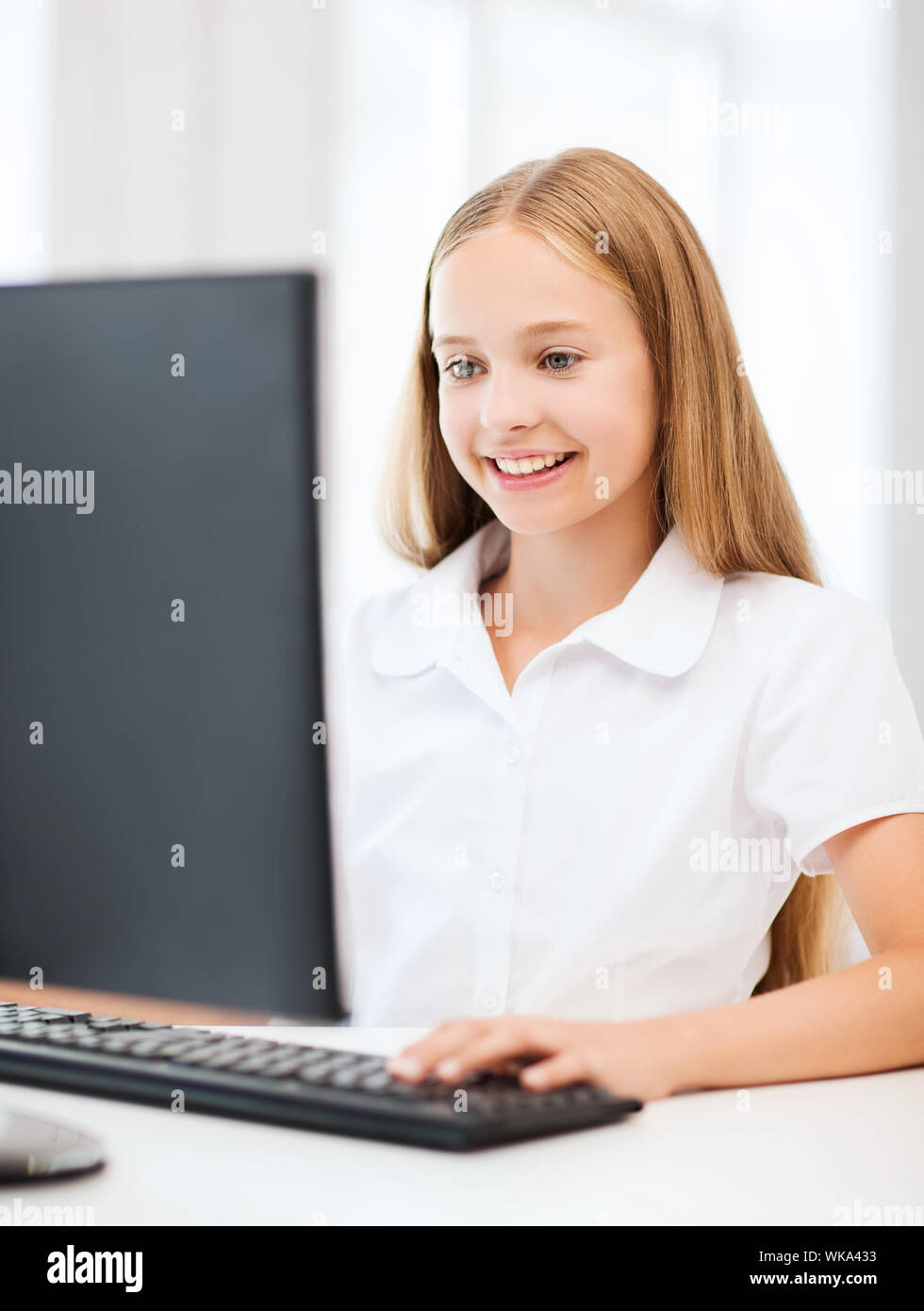 education, school, technology and internet concept - little student ...