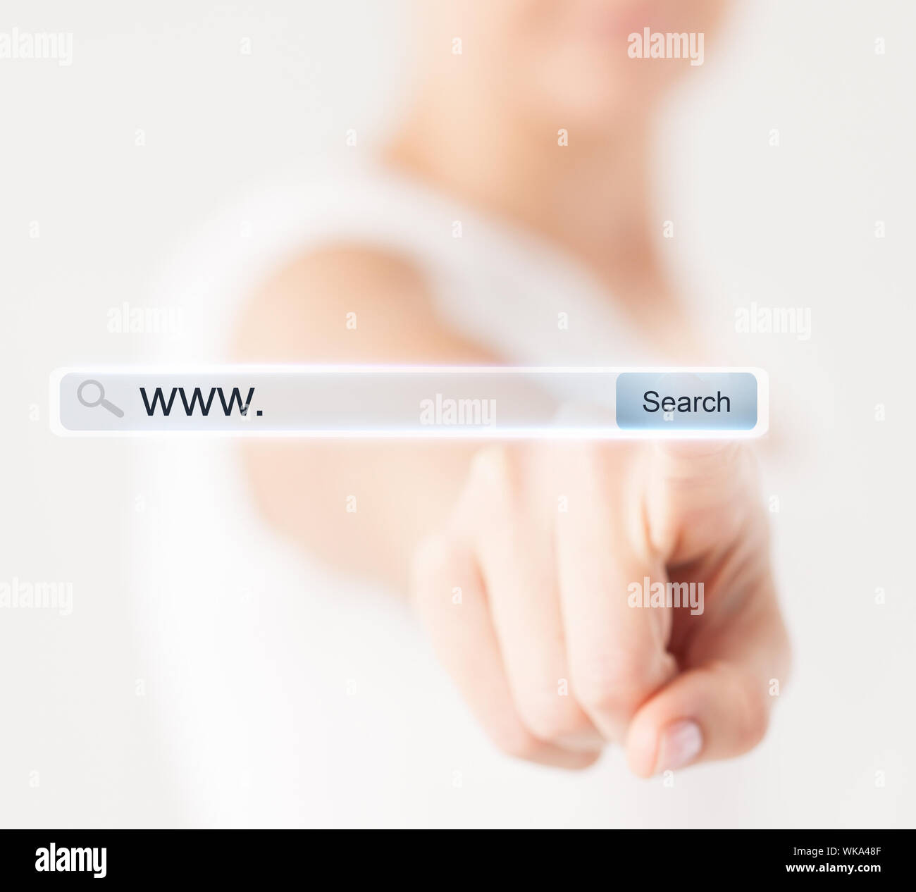 female hand pressing Search button Stock Photo