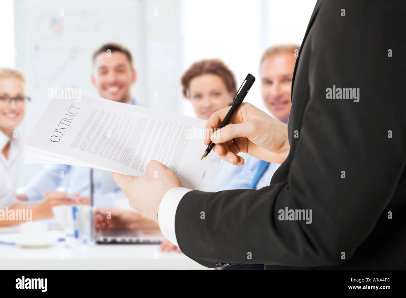 business concept - man signing contract Stock Photo - Alamy