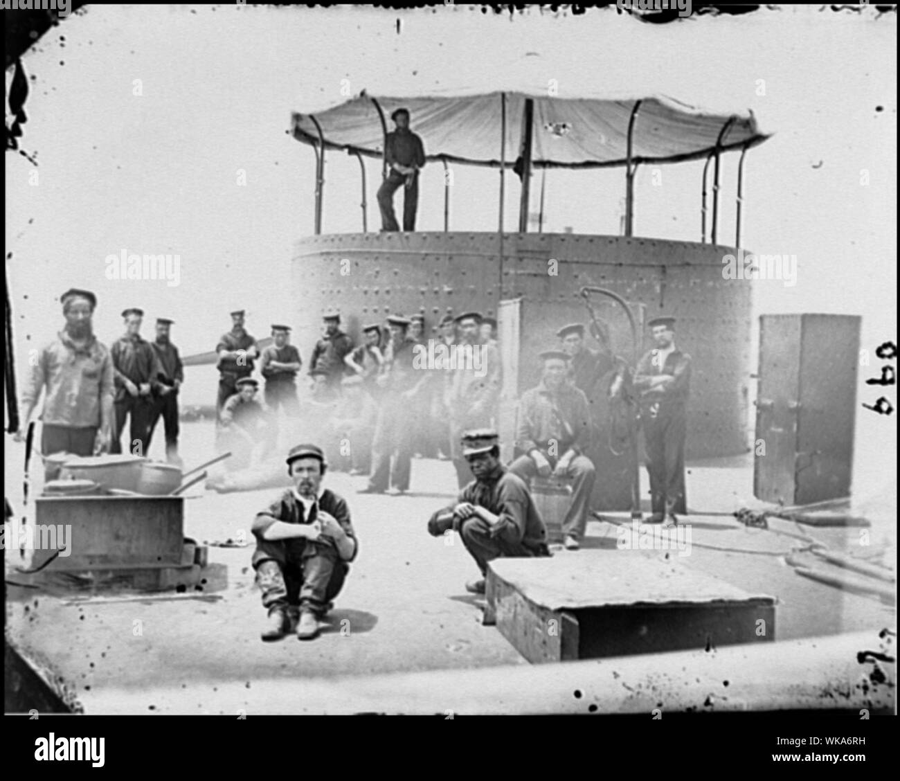 James River, Va. Sailors on deck of U.S.S. Monitor; cookstove at left Abstract: Selected Civil War photographs, 1861-1865 Stock Photo